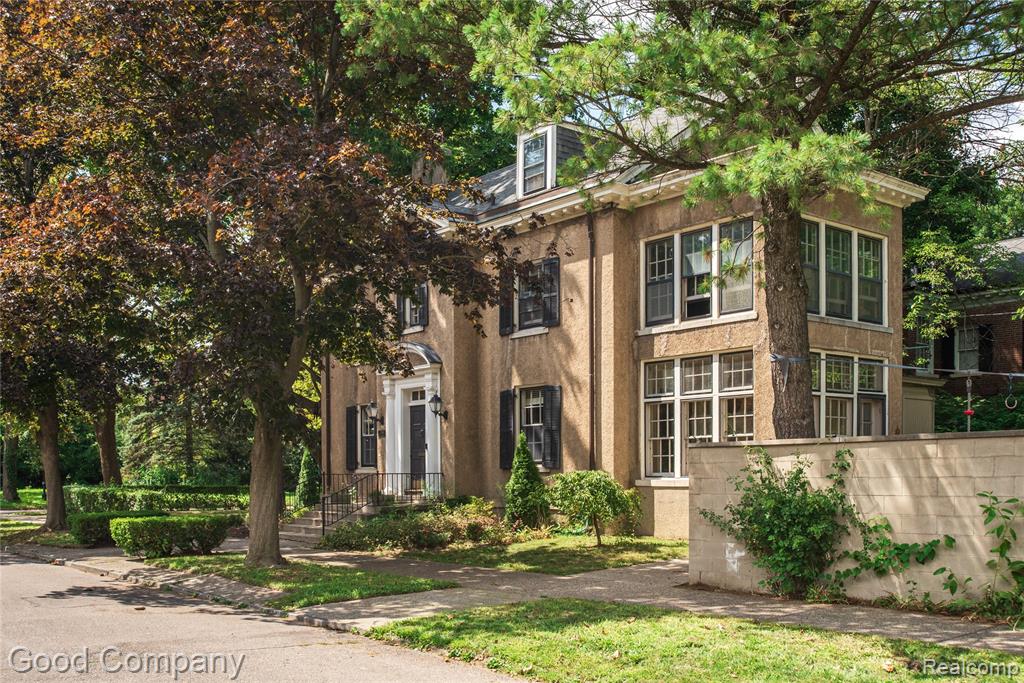 Welcome home to this incredible colonial located in Historic Indian Village. Expertly blending the best of early 20th century character and modern convenience. One of the most stunning central entryway doors ever invites you into the spacious living room which features a gorgeous fireplace, or the formal dining room which flows into a light drenched sunroom overlooking the private backyard. Custom Scavolini kitchen with built-in Miele appliances, super convenient pot filler faucet and gleaming quartz countertops - simply perfect for any chef! Peep the original ice-boxes that now double as storage in the corner. On the second floor, you will find a luxurious primary suite and recently renovated bathroom with high end finishes and attention to the smallest detail, like the heated floors and bidet toilet! Three additional bedrooms and a second full bath with gorgeous, original terrazzo floors. The third floor offers two additional bedrooms and a third full bathroom, perfect for a guest suite. The backyard offers a quiet retreat with raised garden beds, and tall walls for excellent privacy. Speaking of excellence, your location could not be better with dining and shopping within easy walking distance. Just steps to Barkside, Two Birds, Mollicone Park, Sister Pie, The Velvet Tower and more. Plus, only a short drive to Downtown, Belle Isle & Eastern Market! Schedule your private tour today!
