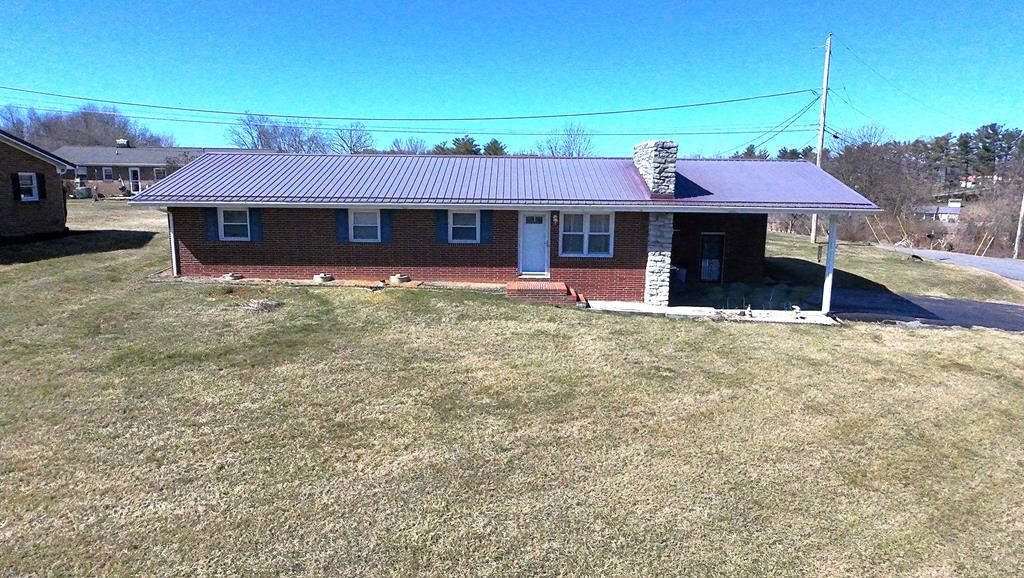 Location, Location, Location...Make this beautiful 4 BR, 2 BA brick ranch located in Green Hill Subdivision, Chilhowie, VA your forever home! This home boasts beautiful hardwood and tile flooring, striking stone gas log fireplace in the living room, spacious kitchen and dining rooms as well as recent updates. Kitchen has plenteous cabinet space, bar area and a breakfast nook. All appliances convey with the sale. The laundry area is off the kitchen area. The home has economical insulated tilt windows with natural light flowing throughout. Private Owners en-suite has walk-in shower and ample closet space. Extra storage overhead with pull-down stairway in the hall. Storage building/workshop in backyard. Just 1.5 miles from downtown Chilhowie, schools, restaurants and more! No town real estate taxes is a plus! Schedule your private viewing today!