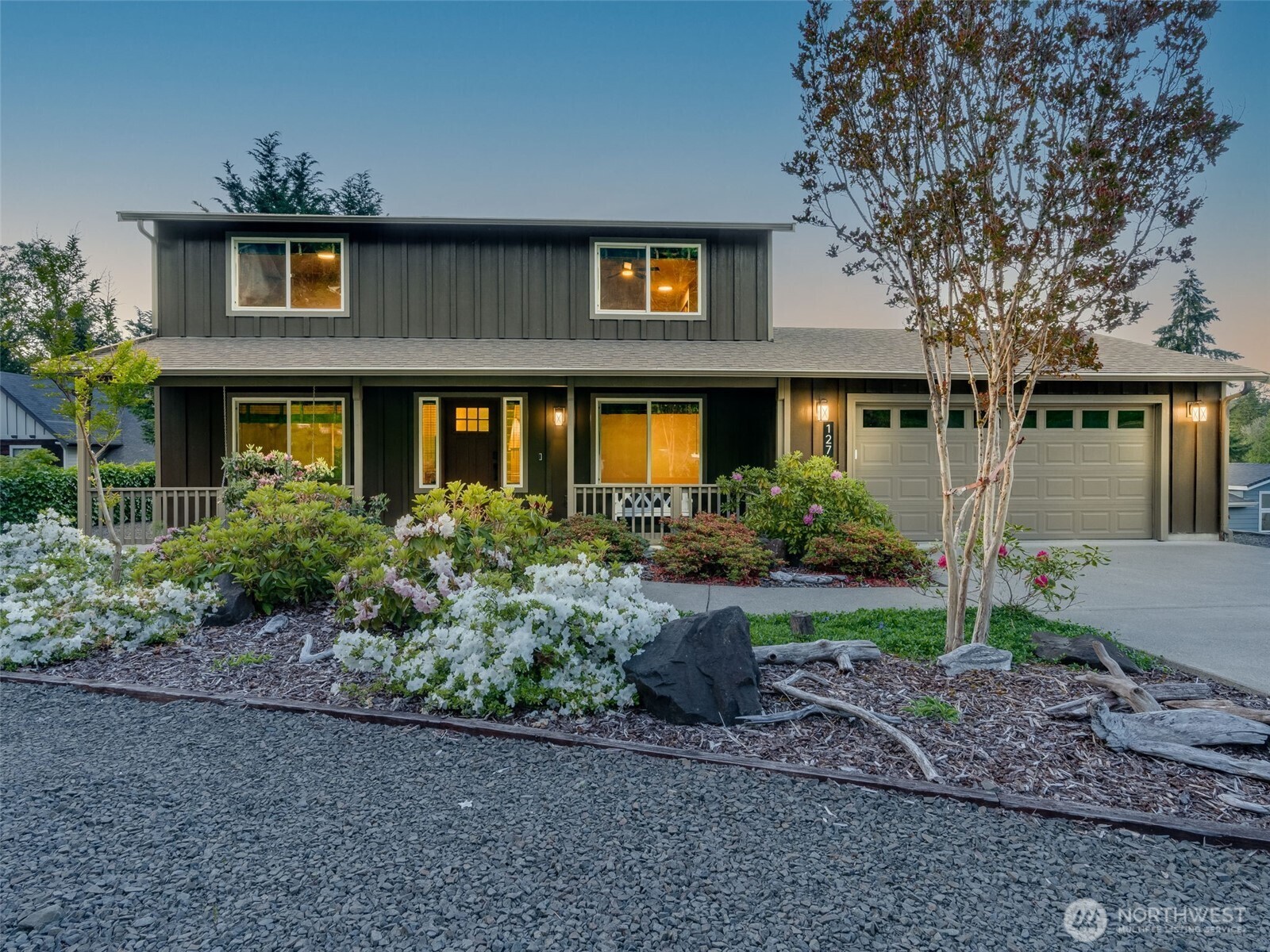 Some homes check boxes. This one changes your pace of life. Located in the sought-after Mayfield Lake community just minutes from the marina,this fully remodeled retreat blends modern comfort w/ the everyday escape buyers are searching for. Mornings on the deck surrounded by trees. Long lake days. Evenings in the hot tub under the stars. Inside, warm hickory cabinetry & woodwork, luxury vinyl flooring, integrated lighting, & smart-home technology create a perfect mix of comfort & function. The kitchen was designed for gathering w/ KitchenAid stainless appliances, gas cooktop, double ovens, Dekton countertops, custom cabinetry, & under-cabinet lighting. The spa-inspired primary suite features a digitally controlled walk-in shower w/ rain head & multi-spray functions, while both bathrooms offer copper sinks & Bluetooth speaker exhaust fans. Custom closet organizers, upgraded hardware, & thoughtful finishes continue throughout the home. Outside is where this property truly stands apart. The expansive 1,000+ sq ft multi-level deck was built for entertaining & unwinding w/ a built-in hot tub, propane hookups for grilling & fire features, automatic stair lighting, picnic seating, & peaceful forest surroundings. Additional features include an insulated garage w/ workshop space, RV hookup, storage shed, smart locks & cameras, whole-house filtration system, newer roof, siding,paint, trim, & hot water heater. Mayfield Lake Marina boat slip may be included w/ a full-price offer.