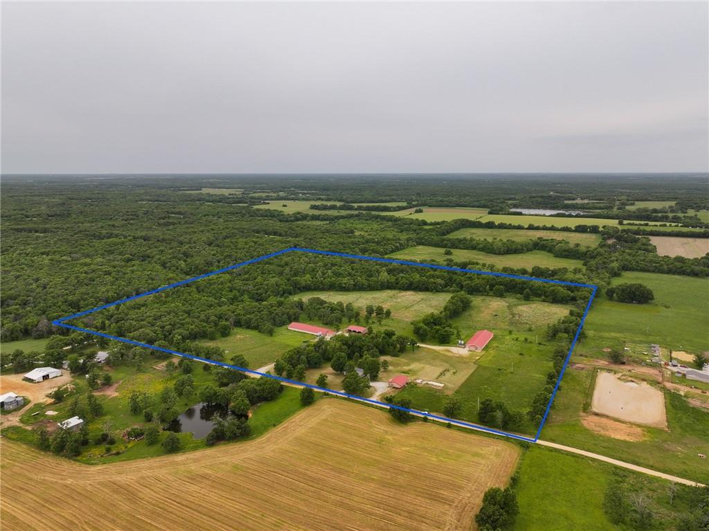 :Land For Sale Vernon County, MO Located at 21346 S 2975 Rd, El Dorado Springs, this 48.43± acre poultry and livestock property offers a rare opportunity to step directly into the commercial egg production industry. Situated just minutes from town with easy access to major highways, this working farm is already set up for production and ready for its next operator. With the growing demand for locally and regionally produced eggs, properties like this are becoming increasingly hard to find in southwest Missouri. The farm features two established poultry barns, each designed to house approximately 5,000 laying hens, giving the new owner the infrastructure needed to operate a sizable commercial egg business from day one. The barns are mostly automated, cutting labor down. One of the biggest advantages of this property is that there are currently no active poultry contracts tied to the farm, allowing a buyer the freedom to negotiate their own egg production agreement or explore specialty markets such as cage-free, farm-fresh, organic, or direct-to-consumer sales. This flexibility creates outstanding income potential for both experienced poultry operators and entrepreneurs looking to expand into the rapidly growing egg market. The 48.43± acres are fenced and offer additional opportunities beyond poultry production. The acreage could easily support livestock, hay production, or future farm expansion. The rural setting provides privacy while still keeping you within a short drive of El Dorado Springs and surrounding communities. Home For Sale El Dorado Springs, MO In addition to the poultry operation, the property includes a 3-bedroom, 2-bath manufactured home with approximately 1,400 square feet of living space. The home provides comfortable on-site living, allowing owners or employees to stay close to the operation for daily management and oversight.