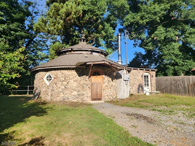 Unique riverfront cottage situated along the Delaware River in Knowlton Township. This charming two-bedroom, one-bath stone home offers a distinctive setting with scenic river views and peaceful surroundings. Features include a detached garage, outdoor areas overlooking the river, and a setting that offers plenty of potential for a weekend retreat, year-round residence, or getaway. Conveniently located near Route 46 with easy access to nearby recreation, hiking, fishing, and other outdoor activities. A unique opportunity to enjoy the beauty and character of Delaware River living.