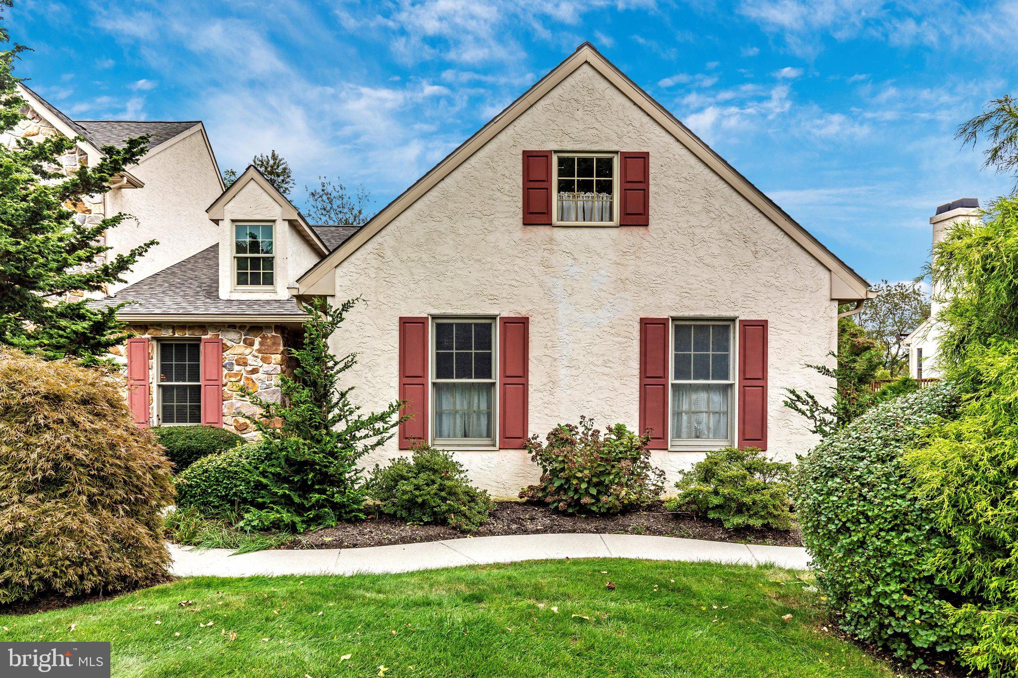 Nestled in the serene enclave of Summerfield, this exquisite twin/semi-detached carriage house offers a harmonious blend of luxury and comfort, perfect for those seeking an elevated lifestyle. With a major renovation completed in 2019, this home boasts modern elegance while retaining its timeless charm. Step inside to discover a thoughtfully designed interior that spans 2,338 square feet, featuring four spacious bedrooms and two and a half bathrooms. The open-concept layout seamlessly connects the dining and living areas, enhanced by warm wood floors and recessed lighting that create an inviting ambiance. The kitchen is a culinary enthusiast's dream, equipped with energy-efficient stainless steel appliances, including a self-cleaning oven and a convenient eat-in space, perfect for casual gatherings. Retreat to the primary suite, where luxury meets tranquility. Enjoy the convenience of a walk-in closet and a beautifully appointed primary bath, complete with a stall shower and a tub shower for ultimate relaxation. Additional interior highlights include cedar closets, a wet/dry bar for entertaining, and a cozy studio space that can adapt to your lifestyle needs. Outside, the property is equally captivating. Set on a 0.19-acre lot that adjoins open space and backs to lush trees, you can relish in the scenic vistas from your deck or porch. The meticulously maintained front and rear yards are included in the association fee, ensuring a pristine environment year-round. Parking is a breeze with a side-entry attached garage and additional driveway space, accommodating multiple vehicles with ease. Located in the middle of the block, this home provides a peaceful retreat while remaining conveniently close to local amenities. The geothermal heating and air conditioning system not only enhances comfort but also promotes energy efficiency, aligning with a modern, eco-conscious lifestyle. This property is more than just a home; it's a sanctuary that invites you to experience the best of luxury living in a tranquil setting. Embrace the exclusive lifestyle that awaits you in this remarkable residence.