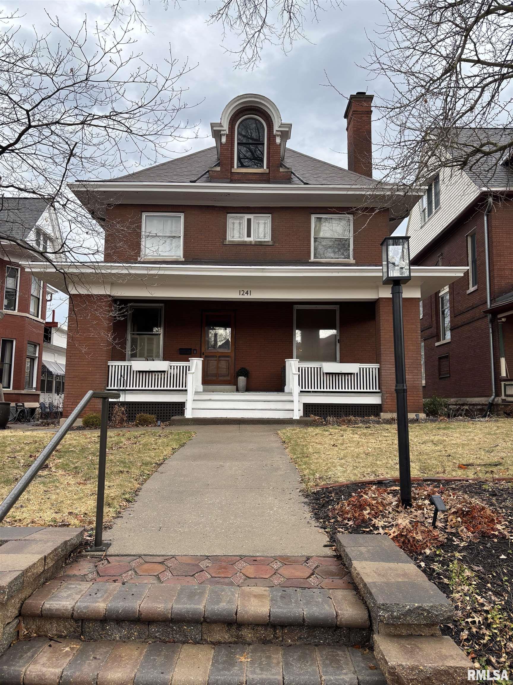 This stunning historic home is located on one of Quincy's last brick streets.  This home has been meticulously maintained for decades (there were only two owners the first 114 years after it was built) and the pride of ownership shows in every corner of this home.  Walking in to the foyer you are greeted by a beautiful baby grand piano that has been in the home for more than 100 years set in front of a gorgeous staircase.  The kitchen was renovated in 2021 and there is an originaly butler's pantry as well as a second large area that is used as a pantry and kitchen storage.  The bedrooms are generously sized with lots of closet space which is rare in a home this age.  One bedroom even has a beautiful sunroom attached.  There is even laundry located on the second floor where four of the bedrooms are located which is a huge bonus!  The park district owns and takes care of grass boulevard in the center of Park Place.  Main roof had a complete strip, new plywood and shingles and guttering system in 2017. Metal portion of roof has been coated with a silicon membrane as preventative maintenance in the past as well.  The large front porch is incredibly inviting and the current owners have improved the exterior with new landscaping in the front and a privacy fence in the backyard as well.  Such a beautiful historic home in the perfect Quincy location.