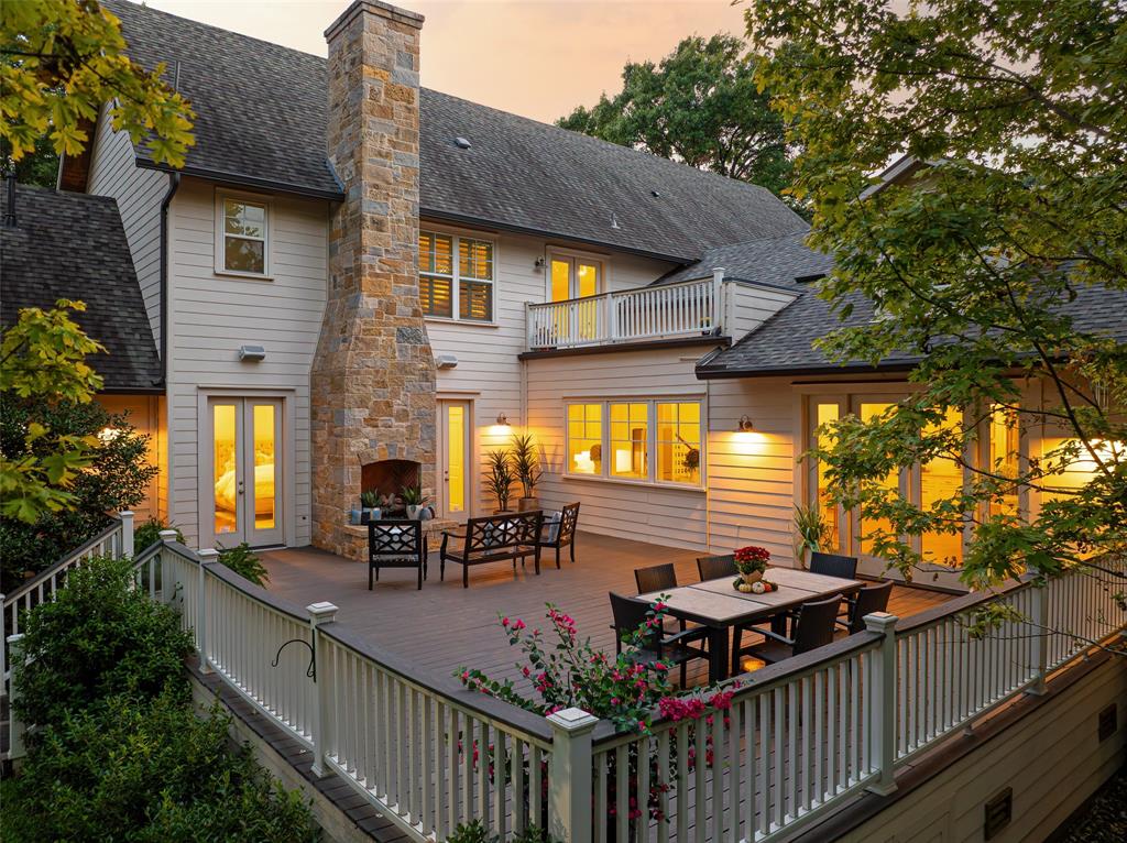 Beautifully set on an oversized, tree-covered lot, this transitional Dallas estate offers modern design, timeless architecture, and exceptional craftsmanship throughout. The open-concept layout features a gourmet kitchen with premium appliances and a large island that flows into a spacious family room with cathedral ceilings and views of the wooded backyard.
Enjoy seamless indoor-outdoor living with a large entertaining deck, outdoor fireplace, and serene natural setting. The flexible floor plan includes a first-floor primary suite, guest bedroom, executive office, and formal dining. Upstairs offers a third living area, bonus room, treetop balcony, and four additional bedrooms—ideal for multigenerational living or remote-work needs.
Located near Love Field, Highland Park Village, Inwood Village, and top private schools, this move-in-ready luxury home provides space, privacy, and convenience in one of Dallas’ most desirable neighborhoods.
