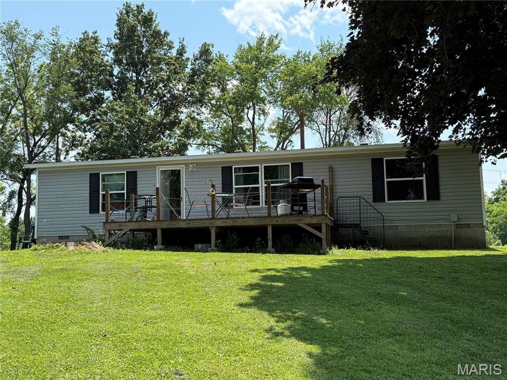 NICE BIG LOT! This 2016 manufactured home features 3 bedroom/2 full bath & sits on almost half an acre. The living room is good size & offers an inviting deck off the front of the home. The spacious eat-in kitchen boasts lots of cabinets & countertop space. The split bedroom floor plan also offers a primary suite. Updates include a new roof & a new shed in 2023. This home is being sold "as is".