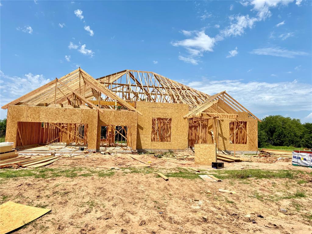 Step into a home that doesn't just check boxes—it steals your heart. 4027 Blue Ridge Avenue isn’t just a house; it’s the space where your story begins. From the double-door entry to the soaring ceilings and stunning architectural touches, every inch radiates warmth, elegance, and soul. Imagine family gatherings around the fireplace, sunlight pouring over custom-built shelves in your private study, and laughter echoing through an open kitchen built to inspire. With quartz countertops, Samsung built-ins, farmhouse sink, and a massive walk-in pantry, this kitchen isn’t just functional—it’s unforgettable. Retreat to a spa-like primary suite with a soaking tub under vaulted ceilings, a designer doorless shower, and a closet you could dance in. The connected utility room adds effortless flow to your daily life. Outside, the covered patio stretches across nearly 1/2 (mol) of an acre, set in a peaceful community Closing costs covered with our preferred lender. Don’t miss your chance to reserve this dream before someone else claims it. Act now and you will be able to choose your colors and upgrades. Easy access to HWY 9, I-35, and OKC hot spots. Serenity meets convenience. This home speaks to the heart and moves fast.