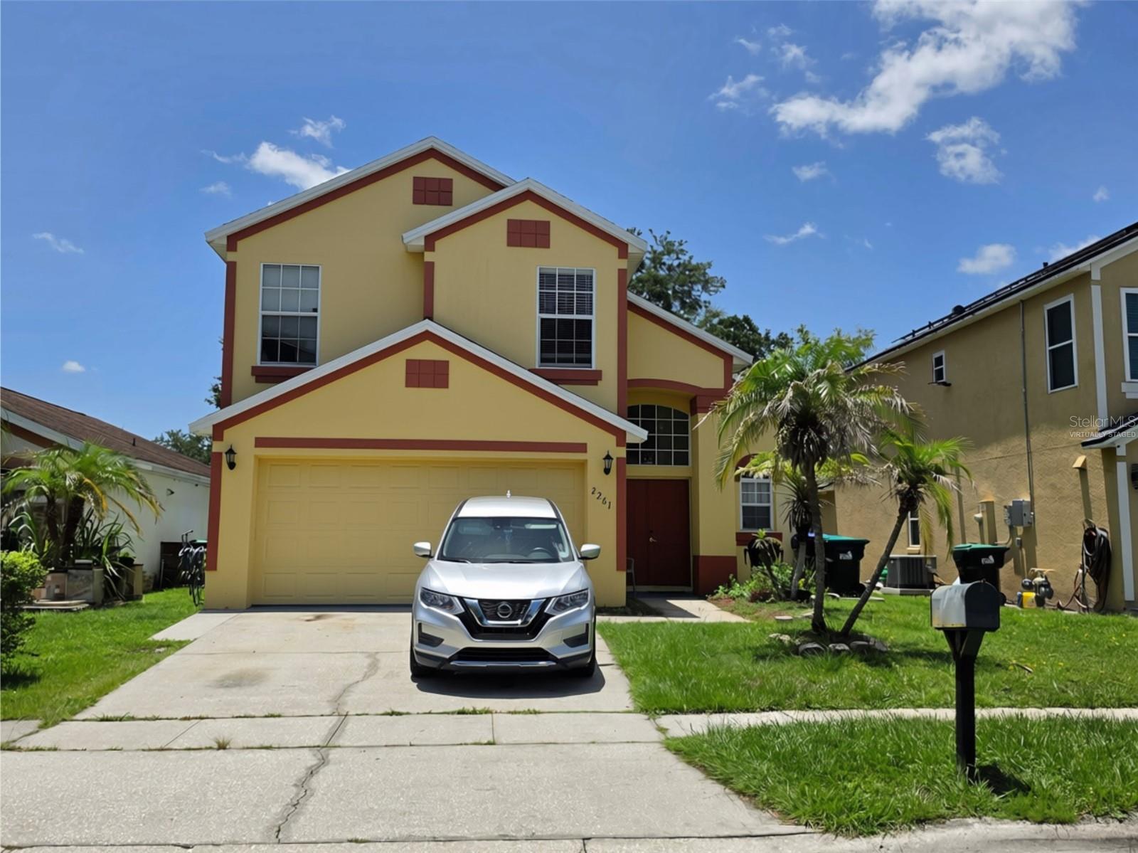 ***Just Reduced***Welcome to this lovely 2-story residence off Central Florida Parkway. This 4-bedroom, 2.5-bath home boasts cathedral ceilings that create an open and airy atmosphere. Enjoy a bright, eat-in kitchen with a stainless steel gas range and a brand new stainless steel fridge, perfect for culinary enthusiasts, and a cozy living area ideal for family gatherings. The primary bedroom is conveniently located on the first floor, featuring a dual vanity en suite and a separate water closet for added privacy. Rest easy with a newer roof (2017), and a new AC system (2021),  ensuring your home is efficient. Step outside to a large, partially fenced backyard, offering plenty of space for outdoor activities, gardening, or simply relaxing in the Florida sun. Enjoy the convenience of being just minutes away from major attractions and shopping venues, making it easy to enjoy all that Central Florida has to offer. This home is not just a property; it’s a place where memories are made. Schedule your showing today!