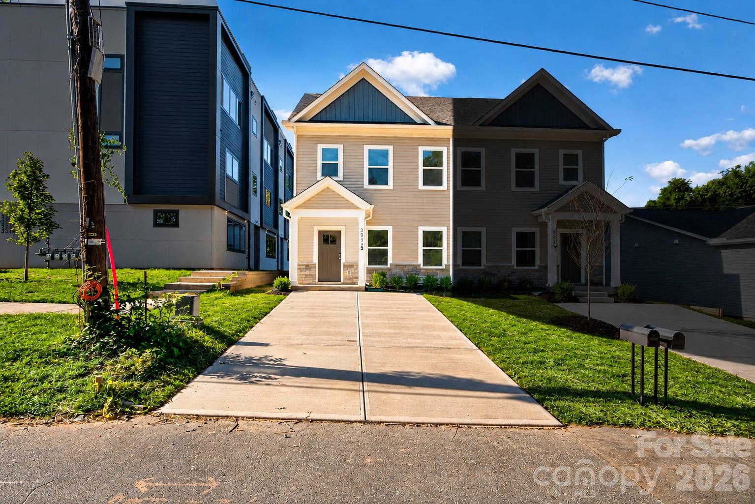 Newly constructed 3 bed / 2.5 bath townhome with NO HOA in Charlotte’s rapidly growing Enderly Park! Move-in ready and built with quality in mind, this modern property features a bright, functional layout on a main-level slab with all bedrooms situated on the upper level. Includes a refrigerator, a 1-year builder's warranty, and a 10-year structural warranty for complete peace of mind. With NO HOA fees, it is perfectly suited for an owner-occupant or a turn-key investment property in one of Charlotte’s most vibrant upcoming pockets! The adjacent unit is also available and can be purchased together as a package.