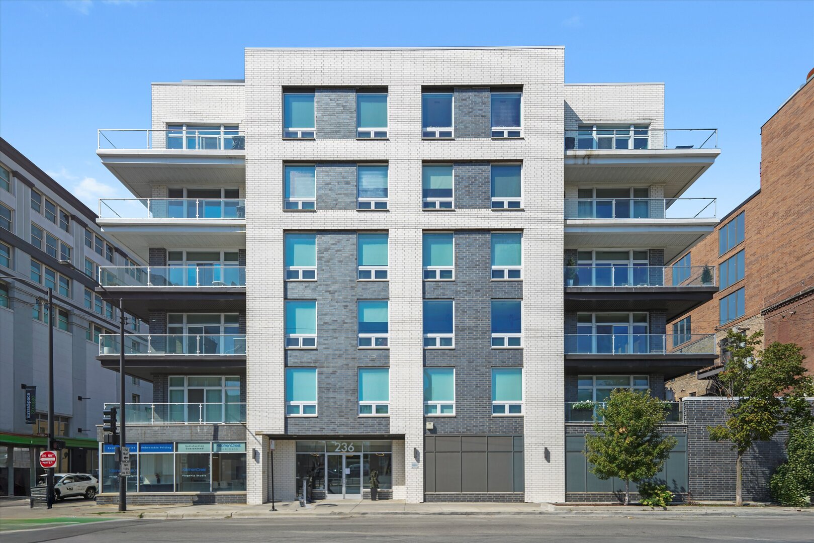 A rare opportunity to own a stunning 4-bedroom, 2.5-bath condo in a boutique building located in the highly sought-after West Loop neighborhood. This exquisite condo has been fully upgraded and repainted, featuring a bright open floor plan . One of the standout features is the impressive 45 ft. south-facing balcony, providing ample natural light and a perfect spot for relaxation. The chef's kitchen is a culinary dream, complete with custom cabinetry, a panel Bosch dishwasher, Viking appliances, quartz countertops, and a wine/beverage fridge.  The primary suite is a luxurious retreat, offering balcony access, custom closets, and a spa-inspired bath with upgraded finishes. Indulge in the oversized walk-in rain shower, dual vanity, and heated floors for an unparalleled experience of comfort and style. Additional highlights of this remarkable home include custom window treatments from The Shade Store, a built-in Murphy bed for versatile living space, and ample custom storage. For those with electric vehicles, an EV charger is included, along with a storage cage and deeded parking, all included in the price. Location is everything, and this condo does not disappoint. Situated within walking distance to the best dining, shopping, and entertainment that the West Loop has to offer, you'll have everything you need right at your doorstep.