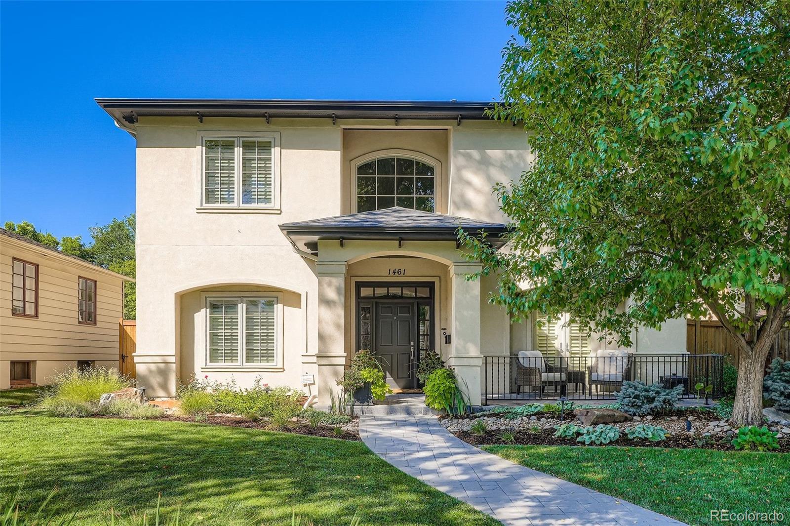 Welcome to this exceptional custom residence with attached three-car garage, nestled in the heart of Denver’s coveted Cory-Merrill neighborhood. Thoughtfully curated for the discerning buyer, this home flawlessly blends design, functionality, and luxury amenities—all within walking distance of the charm and vibrancy of Bonnie Brae and Washington Park. Step inside to discover a refined main level designed for both everyday living and grand entertaining. The formal dining room is perfect for elegant gatherings with french doors leading to a serene front patio, and the dedicated home office features a built-in desk and bookshelves. In the elegant living room, you'll find high ceilings, custom millwork, and a cozy gas fireplace, while the heart of the home—its gourmet kitchen—is a chef’s dream. Enjoy Wolf double ovens and six-burner cooktop, built-in refrigerator, under-counter microwave, custom cabinetry, granite countertops, and generous center island. The butler's pantry has a wine fridge, bar sink, and glass-front cabinetry. Step outside to your private oasis: a fenced-in yard with vegetable garden bed and serene patio space with built-in grill and side burner. The mud room, with designated homework area/desk space and laundry, connects the kitchen to the attached three-car garage—a rare find—offering year-round comfort and convenience. Upstairs, retreat to an expansive primary suite featuring dual walk-in closets and spa-inspired bath. Two additional bedrooms and a full bathroom complete the layout. The fully finished basement adds even more unparalleled features such as the large recreation room with custom entertainment center, spacious guest room and bath, workout and/or office space, and multiple storage closets. Plantation shutters and custom finishes throughout. In the heart of a quiet block, walking distance to award-winning neighborhood schools, perfectly situated near Washington Park and Cherry Creek, this home offers luxury, lifestyle, and location.
