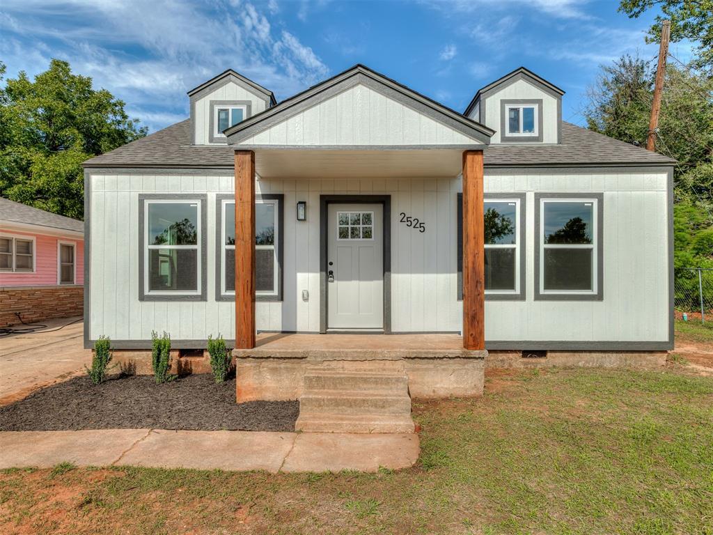 Beautifully reimagined from the studs, this 2-bedroom, 2-bath home combines classic charm with fresh, modern style. The extensive renovation includes approximately 305 additional square feet, (city permits pulled on all work) creating more room to enjoy everyday living.A welcoming covered front porch with natural wood posts sets the tone. Inside, abundant windows bring natural light into the spacious living room, while neutral colors, VLP wood-look flooring, and contrasting dark fixtures create a cohesive look. A graceful arched opening connects the living room to a generous dining area, providing a comfortable layout for gathering and entertaining.The kitchen features crisp white upper cabinets paired with rich dark lower cabinetry, speckled quartz countertops, a white subway tile backsplash, stainless steel appliances, and recessed lighting. A peninsula with breakfast-bar seating offers an additional spot for casual meals, conversation, or meal preparation.The primary suite features a private ensuite bathroom and a large walk-in closet—a standout combination of comfort and storage. A second bedroom and second full bathroom add flexibility for guests, a home office, or everyday needs.Conveniently located with easy highway access to I-35, this home is approximately 10 minutes from the Medical District and 15 minutes from downtown Oklahoma City. A metal single-car carport will be installed prior to closing. The home also qualifies for multiple down payment assistance programs, subject to buyer and program requirements. Contact the listing agent for qualifications and details, and schedule your private showing to experience this beautifully transformed home!