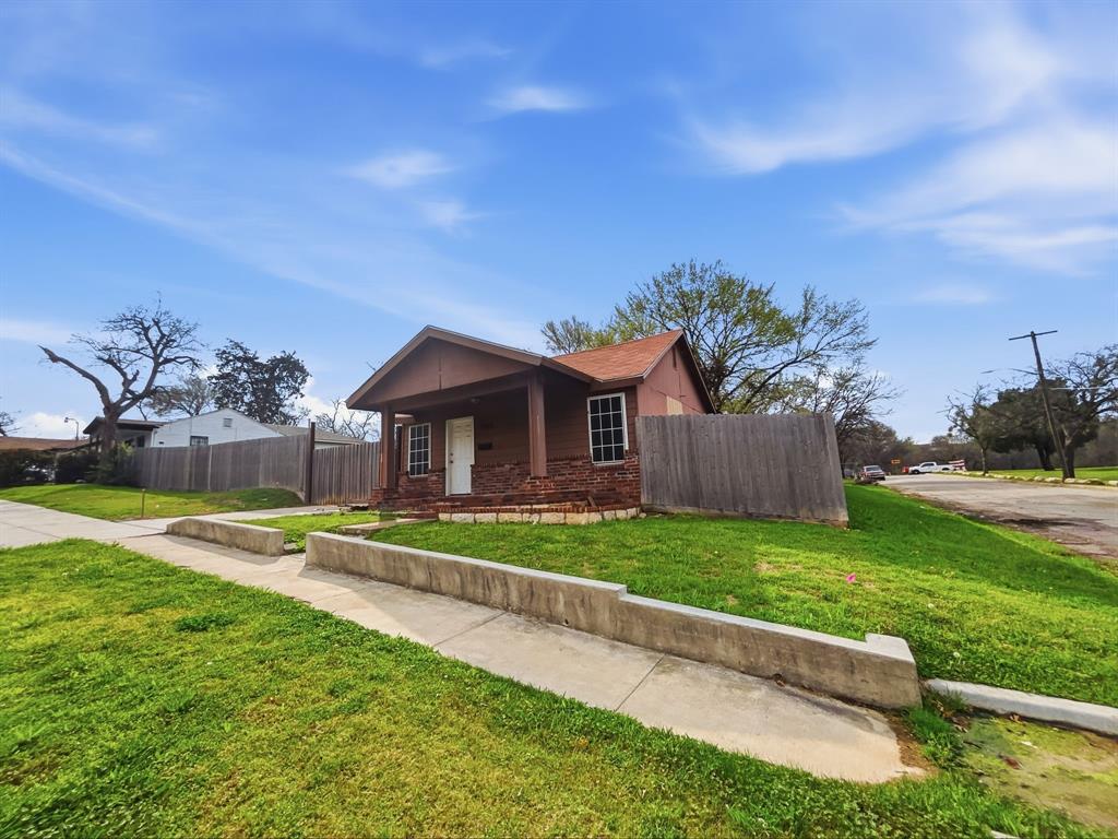 3 bedroom, 2 bath home situated on a spacious corner lot in a convenient location. This quaint property offers a comfortable layout with great potential for a first-time homebuyer or investor seeking a rental opportunity. The large yard provides plenty of space for outdoor activities, gardening, or future improvements. Located directly across the street from Titus Paulsel Park, offering easy access to green space and recreation. The home is also just half a mile from Texas Wesleyan University, making it a great option for those looking to live near campus or add a strong rental property to their portfolio. With its desirable location, generous lot size, and investment potential, this property is a fantastic opportunity to make your own or add to your real estate portfolio.*Stakes in photos show property line and separation from other lot.