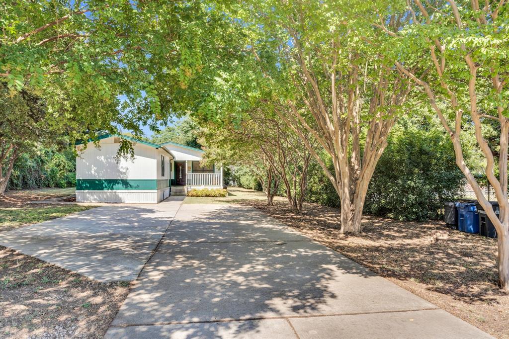 Nestled on a generous 0.45-acre lot in Southlake, this well-maintained property presents an exceptional opportunity: you can either move straight in and enjoy comfortable living now, or leverage the spacious, tree-lined lot to build your dream home in one of the area's most sought-after areas of Dallas-Fort Worth. With residential and commercial zoning flexibility, the property offers the various opportunities, making it a rare and versatile find for both homeowners and savvy business owners! The surrounding area is rich in amenities, as well as in close proximity to Southlake Town Square, parks, and top-tier schools!