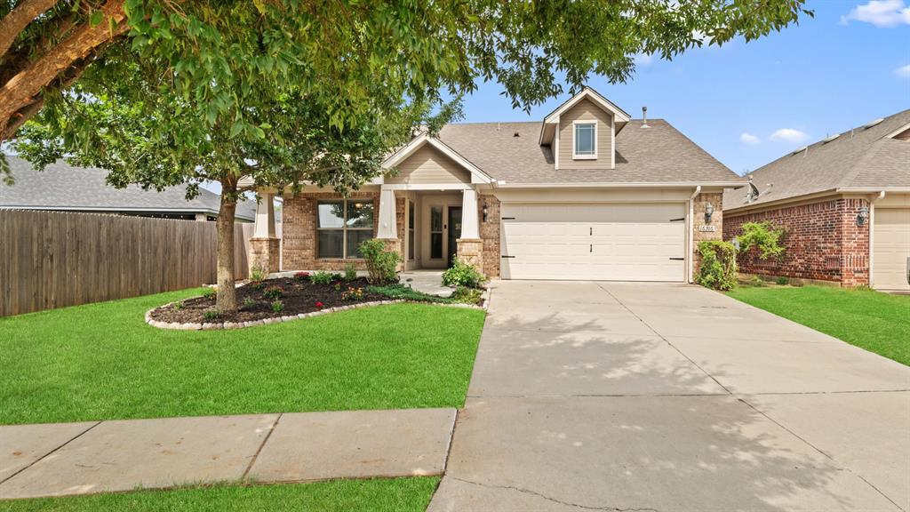 Charming Home in Sought-After Featherstone Community!

Welcome to this beautifully maintained 3 bed, 2 bath home nestled in the popular Featherstone neighborhood—offering amenities like catch-and-release ponds, splash pads, and playgrounds.

From the moment you walk in, natural light pours into the open floor plan, accentuated by vaulted ceilings, rich hardwood floors, and a cozy gas fireplace. The kitchen boasts white cabinetry, gleaming countertops, stainless steel appliances, and a spacious pantry.

The primary suite is a true retreat with a garden tub, separate shower, double-sink vanity, and walk-in closet. Step outside to enjoy both a large covered front porch surrounded by a landscaped flower garden and a private covered back patio overlooking the spacious backyard.

Additional features include oil-rubbed bronze fixtures, a 2-car garage, and an **inground storm shelter** for peace of mind.