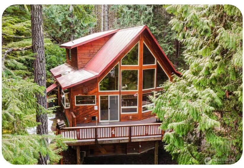 Escape to the mountains! This beautiful, spacious, locally built two-story custom cabin offers 2,232 sq ft of comfortable mountain living near Packwood. Tucked away on a peaceful cul-de-sac in the desirable Timberline community, this inviting retreat features 3 bedrooms plus a bonus room and 2.25 baths, and backs directly to the breathtaking Gifford Pinchot National Forest—offering privacy, serenity, and endless outdoor adventure right from your doorstep. Designed for gathering and relaxing, the home provides the perfect setting for a true Pacific Northwest getaway. Whether enjoying cozy evenings indoors or spending your days exploring the surrounding mountains, this cabin delivers the ideal balance of comfort and nature. The property has also been a successful vacation rental when not enjoyed by the owners and sleeps up to 10 guests. Residents and guests enjoy the many Timberline community amenities, including swimming pools, tennis courts, clubhouse, play field, and playground. Adventure awaits just minutes away—only 15 minutes to the entrance of Mount Rainier National Park and about 20 minutes to skiing and year-round recreation at White Pass Ski Area. Lovingly shared with guests since 2009, this special mountain retreat has created years of unforgettable memories—and is ready to welcome its next owners to start their own.