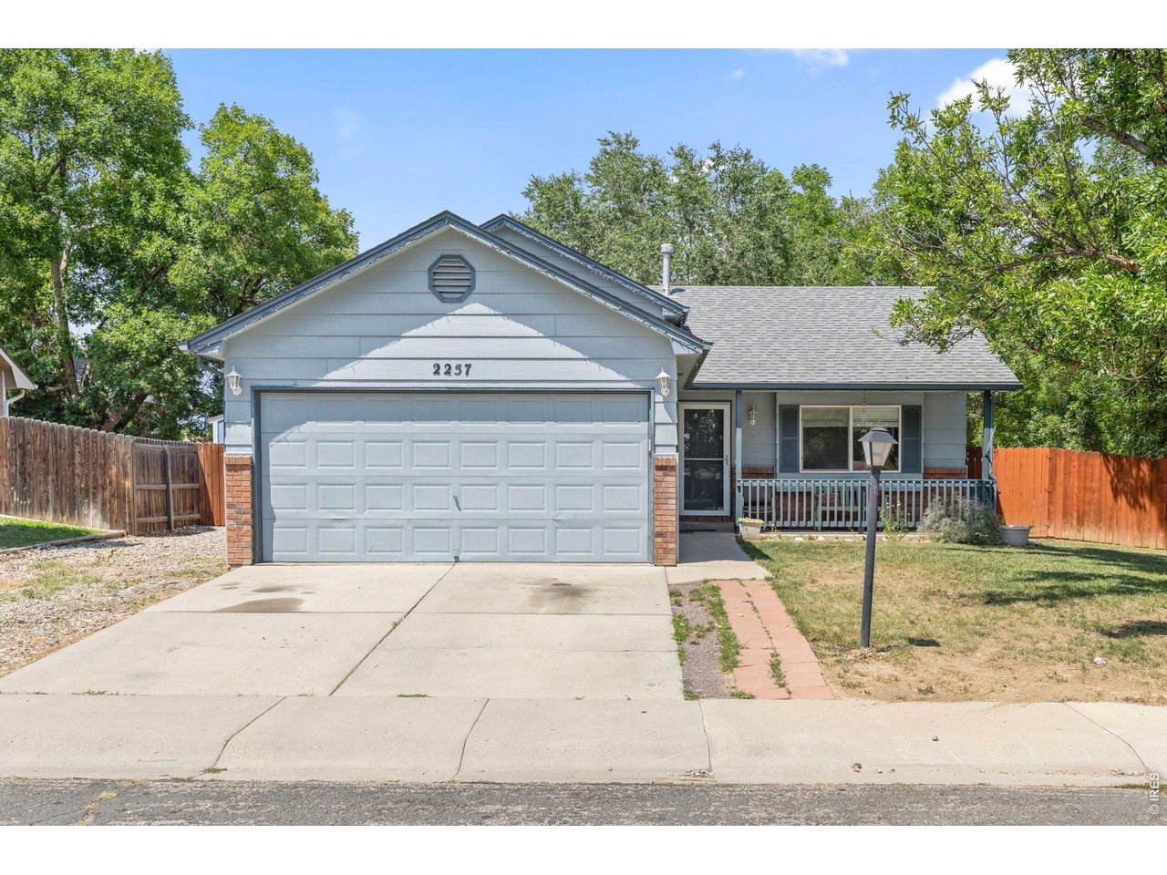 Great find in Loch-Lon - Southwest Loveland's sought-after, no-HOA neighborhood outside city limits! This 3-bed, 2-bath tri-level was completely rebuilt from the ground up in 2013, including a new roof, and features an energy-efficient A/C, heater, and humidifier (2023). Sellers preferred lender offering a 1-point buydown, putting qualified buyers in a lower interest rate. Set on a spacious corner lot with mature trees, the home offers RV parking plus extra street parking, and abundant storage between the main and lower levels. The oversized fenced backyard features: covered deck with Trex decking, privacy shades, a 4-person Saluspa hot tub, and a dog-friendly half-turf/half-grass yard with dog run and connected Tuff Shed dog house - all wired with heat, A/C, and electricity. All included for the new owner. Unbeatable location: Loch-Lon Park, Sarah Milner Elementary, Walt Clark Middle, and Thompson Valley High School all within walking distance, plus Thompson Valley Towne Center (King Soopers, Chase Bank, and more) just half a mile away. A quiet, friendly neighborhood - this home is the definition of real Colorado living.