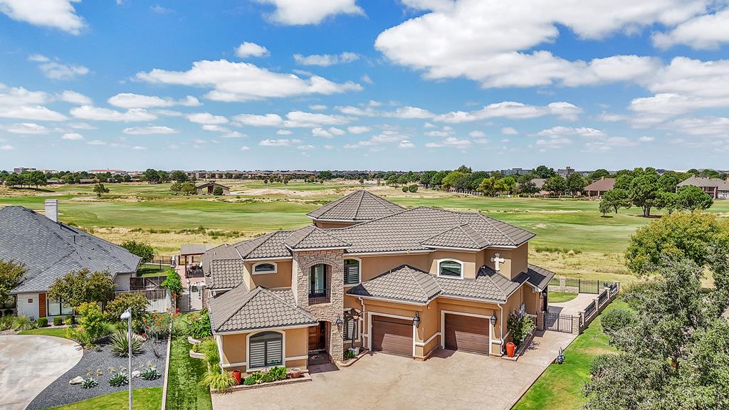 1 Santa Barbara-Luxury Golf Course Living! 4415 sqft -quiet cul-de-sac, this exquisite home offers stunning curb appeal, a long driveway, and a spacious 3-car garage + golf cart garage. perfect for the golf enthusiast. Step inside and be wowed by the high-end finishes, from gorgeous granite countertops to custom cabinetry and detailed woodwork throughout. EVERY upgrade! 6 AC units, OUTDOOR kitchen, multiple seating areas. Stunning pool! Colorful water features controlled by an app! MUST SEE!!