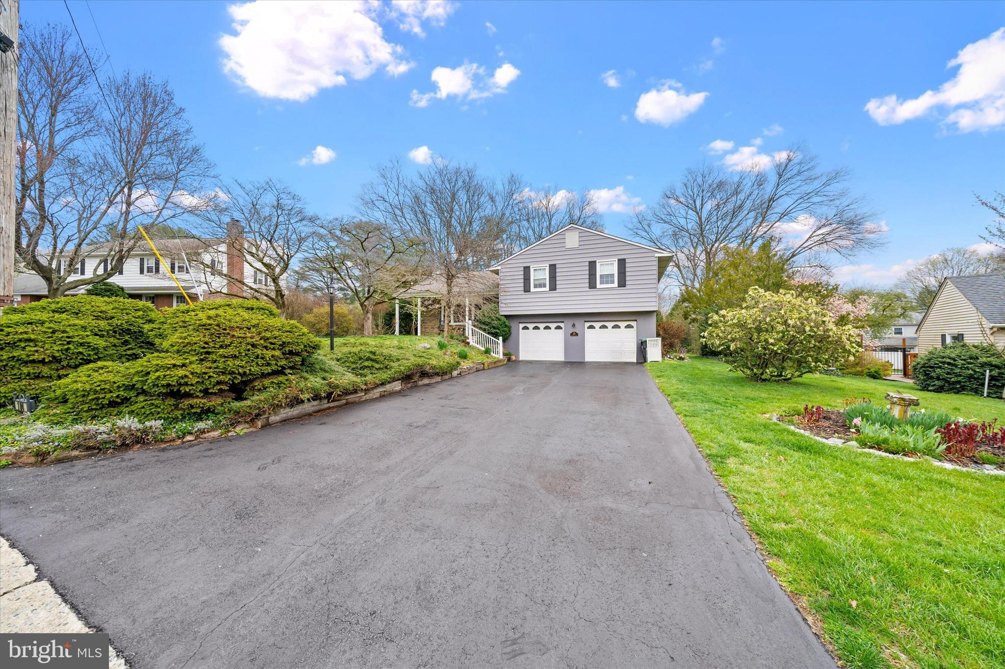 Welcome to your new home in Windybush on over a quarter-acre lot (.34). This neighborhood is located off Silverside Rd. in North Wilmington. This is a wonderful, family-friendly, low-traffic, 1-way-in, 1-way-out community with a very active Civic Association. There is also a community swim club within walking distance for all of your summer fun. The large, covered front porch adds to the curb appeal and is the perfect place to sip some sweet tea on a warm summer day. The double-wide flat driveway with a 2-car garage provides plenty of parking for all your guests.Enter through the front porch door into the tiled floor foyer with a coat closet. This open floor plan allows you to mingle with your family and guests as you prepare meals in the well-equipped, beautifully updated kitchen. The spacious kitchen offers lovely, solid cherry wood cabinets, granite countertops, and an island with space for barstools.The combination LR/DR features a wood-burning stone fireplace and stunning refinished solid oak floors (2025). There is a double French door in the dining room that leads out to the 2-tier, maintenance-free deck. This is a perfect, private area for your summer BBQ's.Head downstairs to the large family room, which features new flooring and a back door to the concrete patio. There is a convenient half-bath as well as a door for inside access to the 2-car garage. The other door leads to the clean, spacious basement and laundry area. This is also a great area for exercise equipment, craft room, etc.Upstairs, you will find the primary bedroom with an ensuite bathroom. There are three other spacious bedrooms with ample closet space, as well as an updated hall bathroom. The amazing, gleaming, solid oak hardwood floors were just refinished in the fall of 2025. Simply gorgeous!!Check out the list of updates these sellers have invested in this beautiful home during their 38-year ownership. Schedule your tour soon!All room sizes are approximate. Back on the market due to buyer default. No fault of the seller.