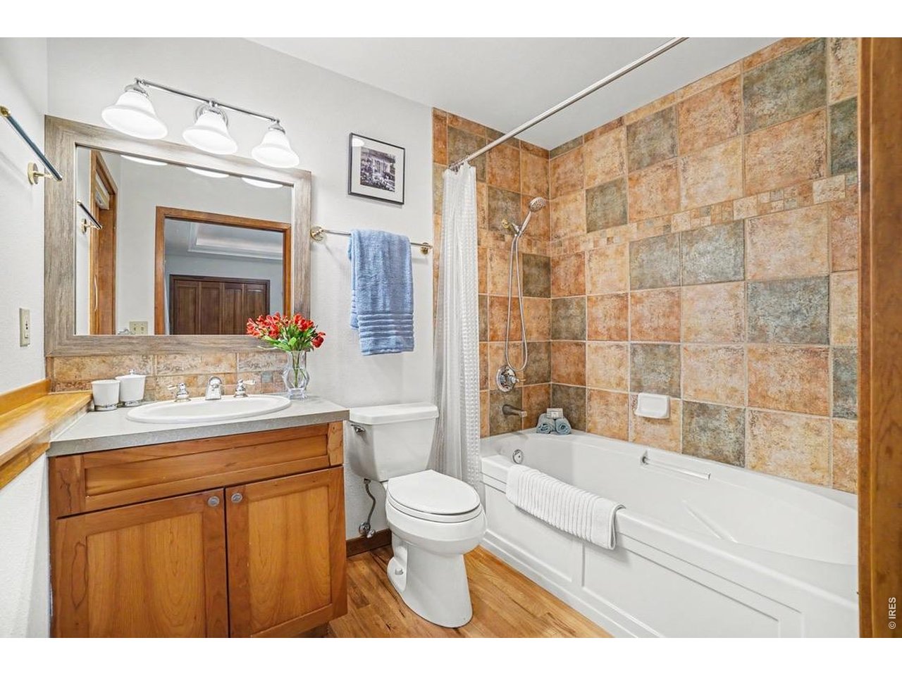 Discover the warmth and beauty of this well-maintained mountain home, thoughtfully positioned to capture mountain views while enjoying a private setting in the desirable Carriage Hills neighborhood. Designed with quality in mind, this inviting Craftsman-style home offers 2,269 square feet, 3 bedrooms, 3 baths, and a floor plan that is both comfortable and welcoming. The heart of the home is the open great room, with exposed beam ceilings, dormer windows, rich oak flooring, and a floor-to-ceiling stone fireplace, which creates a comfortable gathering space. The efficiently updated kitchen features a Samsung dual-fuel range, cherry cabinetry with custom pull-outs, and granite countertops. The kitchen flows seamlessly into the dining and living areas, making everyday living and entertaining effortless. The spacious primary suite is a peaceful retreat with its own fireplace, beautifully remodeled bath, generous walk-in closet, and private sitting area-an inviting place to begin or end the day. More than a beautiful mountain home, this is a place where quality, thoughtful updates, and a warm, welcoming atmosphere come together to create a home you'll look forward to returning to every day.