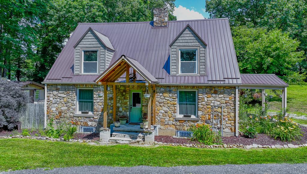 This beautifully restored historic stone home sits on 3 peaceful acres just 2 miles from downtown Damascus and 9 miles from Abingdon. Enjoy the perfect blend of privacy and convenience in a quiet neighborhood with scenic surroundings. Inside, you'll find original hardwood floors, three stone fireplaces with gas logs, and a fully renovated open-concept kitchen featuring granite countertops, pot filler, stainless steel appliances, and farmhouse sink. A Schlage keyless entry opens to a cozy patio with covered pergola, grill, and outdoor dining space--ideal for relaxing or entertaining. The spacious living room connects to a large covered porch. The home offers 3-4 bedrooms (including a private ground-level entry room), three updated bathrooms, and basement plumbing ready for a fourth. The partially finished basement includes a laundry room, bar area, wine/canning room, and a mechanical room with a large safe. Upgrades include Lutron lighting, PEX plumbing, a dual heating system (gas/electric HVAC and an exterior wood stove), dual water heaters, two freezers, and a Generac backup generator. Most windows are updated, with select originals preserved for character. Outdoor Highlights: Semi-paved circular driveway with rear access 24-ft above-ground pool (plumbed for power and heat) Mature Orchard, large garden, 6x8 greenhouse, and water feature Firepit, 2-story outbuilding, workshop with loft and freezer. Barn with pasture, chicken coop, and underground utilities (ready for hookup) Children's play area with playhouse and playground Security system with cameras and high-speed Point Broadband Internet. With frontage on three roads, no nearby development, and no storm damage history, this home offers long-term peace of mind. A rare combination of historic charm, thoughtful updates, and stunning outdoor space--schedule your private tour today! *Please ensure all lights are turned off after showing. IT IS THE SOLE RESPONSIBILITY OF BUYER AND BUYER AGENT TO VERIFY ALL INFORMATIO