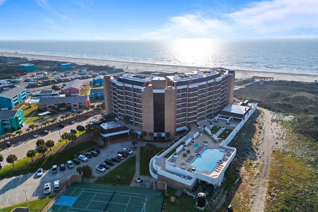 Wake up to breathtaking Gulf views from this 6th-floor coastal retreat at Aransas Princess #611. This spacious 2-bedroom, 2-bath condo plus den offers an open-concept layout with floor-to-ceiling windows and a private balcony overlooking the beach&mdash;perfect for enjoying sunrise, sea breezes, and the sound of the waves. Designed for comfort and flexibility, the den provides additional sleeping space or office, while tile flooring throughout ensures easy, low-maintenance living. The living, dining, and kitchen areas flow seamlessly, creating an ideal space for relaxing or entertaining. Both bedrooms are generously sized, and the unit conveys fully furnished&mdash;making it completely turnkey for personal use or rental income. Aransas Princess offers resort-style amenities including huge pool & hot tub, tennis/pickleball courts and games area, private beach boardwalk, and assigned covered parking. Located on Beach Access Rd 1A, just minutes from Port Aransas dining, shopping, and entertainment.