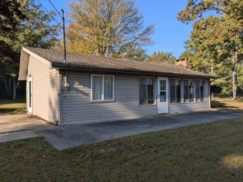 Three bedroom home with 2 car garage on 6.8 acres. This home or up north getaway is only 1 mile north of Long Lake Village and very close to the Huron National Forest for easy access to the ORV and Snowmobile trail system. The property is a mix of open land and some wooded areas. Great recreational area for hiking, hunting, fishing or just enjoying nature. Hot water heater and well pressure tank are in the partial basement. Nice size living room with wood fireplace.