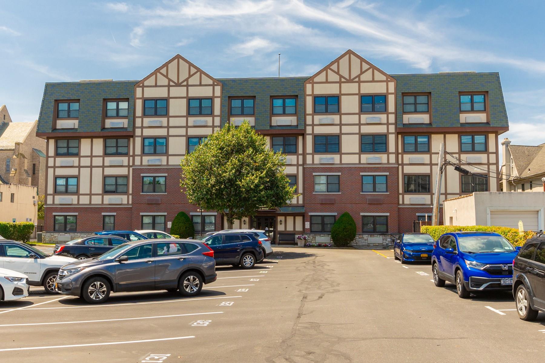 This spacious and inviting fourth-floor condominium is located in the Cathedral Condominiums, a desirable 55+ community in the heart of Rockville Centre. Just a block and a half from the LIRR, across from Saint Agnes Cathedral, and close to shopping and dining, this four-story elevator building offers a prime location. Building amenities include on-site parking with an assigned space, a beautifully designed lobby, a large finished recreation room on the lower level available for private events, and a generous storage locker. Inside, the unit features an entry foyer with a large closet, leading to a well-appointed kitchen with classic wood cabinetry, hardwood flooring, granite countertops, stainless steel appliances, and a center island. The kitchen opens into a bright, spacious living room/dining area, ideal for entertaining or relaxation. A hallway leads to the primary bedroom with a walk-in closet, a second bedroom, a full bathroom with shower/tub and a powder room. The powder room also provides access to a laundry room with extra storage. Very low taxes. Assigned parking spot. Each unit includes an 8' x 10' storage area in the basement. Residents enjoy a spacious community room for parties & special occasions.  Owner pays RVC electric. This apartment provides all the elements for a comfortable and convenient easy-care lifestyle. Min Age 55