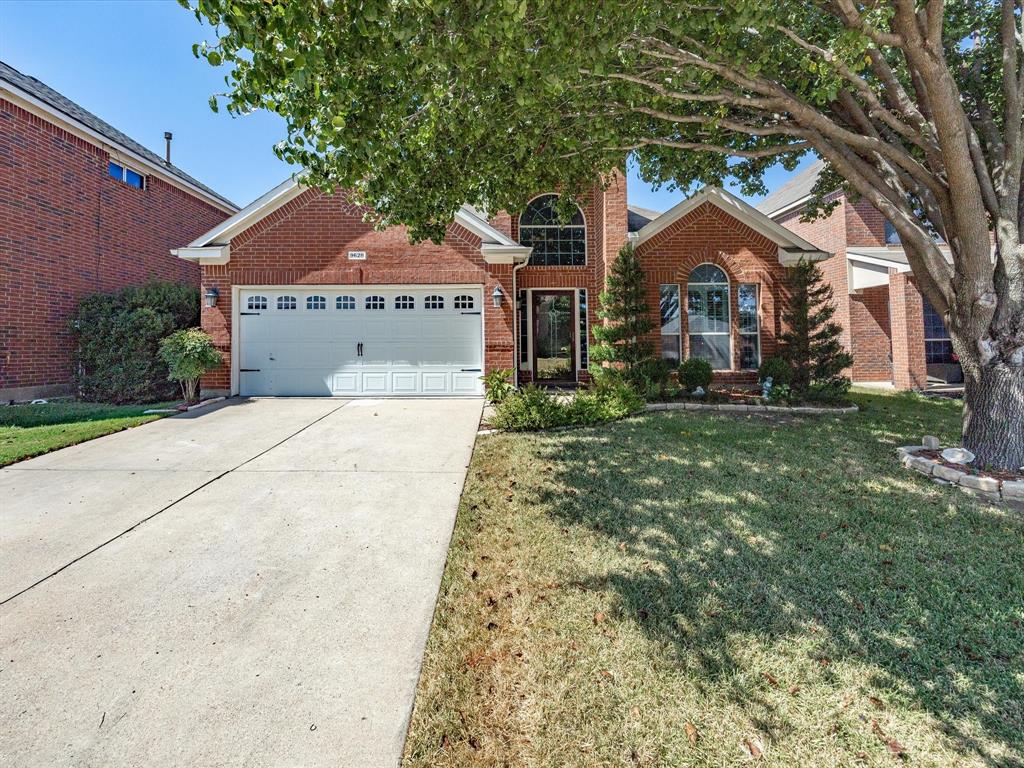 Beautiful and well-maintained 2 story home featuring 4 bedrooms and 3 full baths, with all bedrooms conveniently located on the main level. This home showcases stunning arched openings, rounded corners, and tall ceilings throughout. The open concept design offers two living areas, two potential dining spaces, and an upstairs bonus room with a full bath, perfect for guests or a game room. The kitchen boasts tall ceilings, a gas cooktop, large island, granite countertops, plenty of cabinet space, and a pantry. The cozy living room features a wood burning fireplace with a gas starter. The spacious primary suite includes a large bay window with bench seating, two closets, a walk in shower, jetted tub, and two separate vanities. Outside, enjoy mature trees that provide great shade, beautiful landscaping front and back, a storage shed, and a full sprinkler system. This home has been lovingly maintained and is truly move in ready!