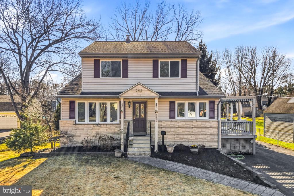 Welcome to this beautifully maintained multi-level home in highly desirable Moorestown, offering charming curb appeal, thoughtful updates, and a flexible layout designed for modern living. Step inside to a spacious and stylish living room, currently showcased as a formal dining area, featuring hardwood flooring, crown molding, and a statement light fixture—perfect for entertaining or everyday use. The heart of the home is the stunning, fully updated kitchen, featuring custom cabinetry, quartz countertops, stainless steel appliances, a designer tile backsplash, and a sleek range hood. This bright and inviting space also offers access to a side deck, ideal for outdoor dining and gatherings. The next level features a fabulous custom-built primary suite with a private ensuite bathroom, creating a comfortable and private retreat. This level also includes an additional bedroom and a full hall bathroom. The upper level offers two generously sized bedrooms, providing flexibility for family, guests, or a home office. The lower level is a true highlight, offering a huge, sun-filled entertainment space with multiple living areas, a ventless gas fireplace, and plenty of room for relaxing, working, or play. This level also includes a spacious laundry room, an updated powder room, and direct access to the backyard, making it ideal for everyday living and entertaining. Step outside to enjoy the patio and large fenced-in backyard, offering plenty of space for barbecues, outdoor activities, and gatherings. Walking distance/biking distance to Sunnybrook Swim Club and outdoor Pickleball Courts by the Lenola Fire House.  This home combines style, space, and functionality in one of Moorestown’s most sought-after locations, close to shopping, dining, and major roadways.