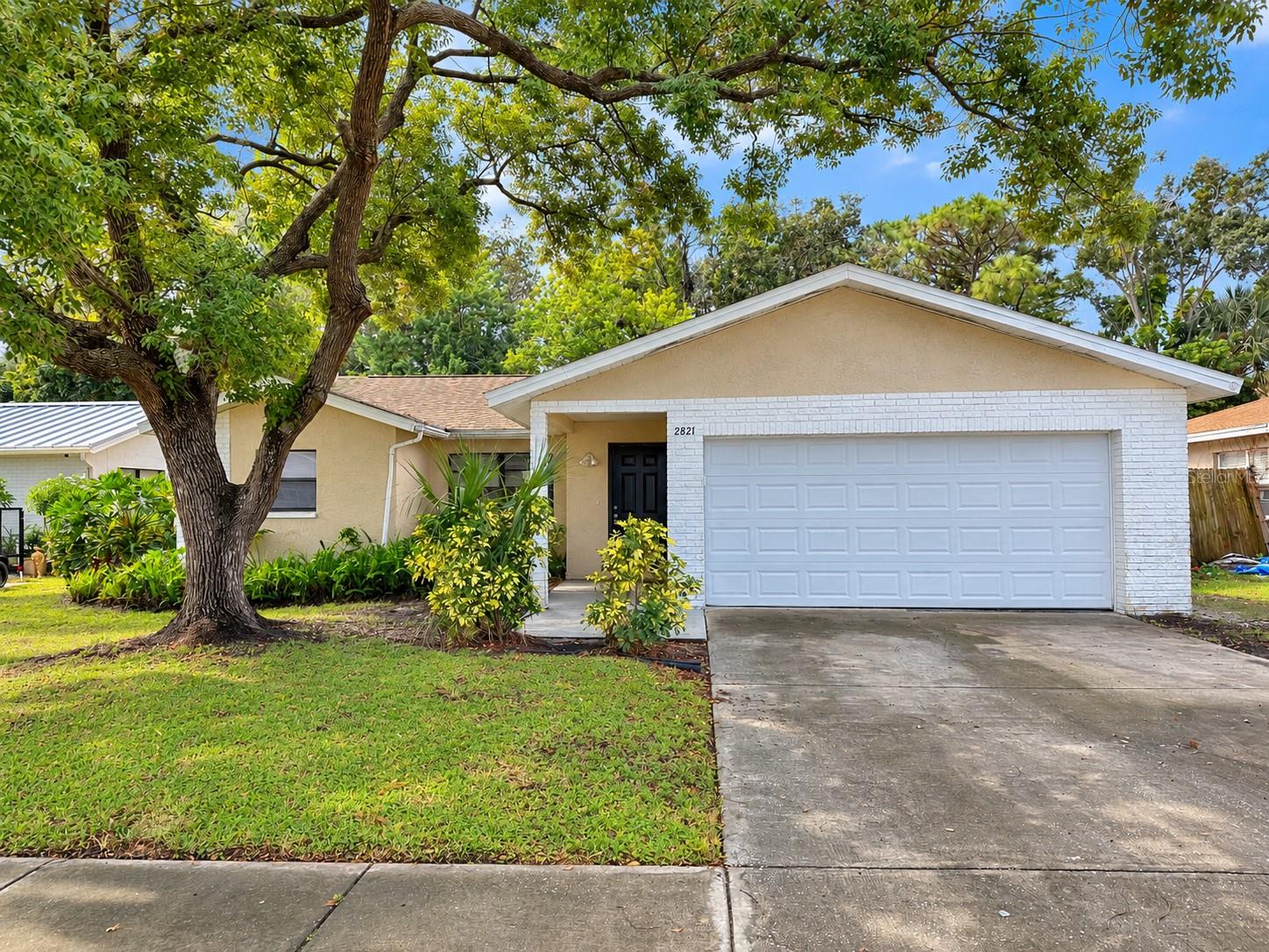 Excellent Buying opportunity awaits with this three bedroom, two bath home featuring an attached two car garage and a desirable split-bedroom floor plan. The updated kitchen offers custom cabinetry, generous workspace and a functional layout for everyday living. The spacious primary bedroom includes its own private bath along with glass sliders providing direct access to the rear yard. Enjoy the large fenced in yard big enough for family BBQ's and the neighborhood is charming with tree lined streets. Conveniently located near shopping, restaurants and everyday amenities, this property offers plenty of potential for a buyer ready to make it their own. Home needs work and is being sold in "as-is" condition offering an opportunity for a Buyer to make improvements and add their own personal touches.