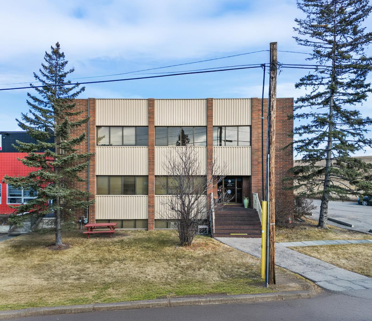 Three-storey office building totalling 6,600 sq. ft., comprising 4,400 sq. ft. on the main and second floors and 2,200 sq. ft. of finished lower-level space. The building includes a combination of exterior offices and private floor areas, allowing for flexible configuration. Drive-up access and building signage facing McKnight Boulevard and Deerfoot Trail are available. Parking consists of 13 on-site surface stalls, with additional street parking available. The property is located near McKnight Boulevard and Barlow Trail NE, in proximity to Calgary International Airport, and approximately 16 minutes from Downtown Calgary. Nearby amenities include restaurants, hotels, golf courses, and public transit, with a C-Train station approximately five minutes away.