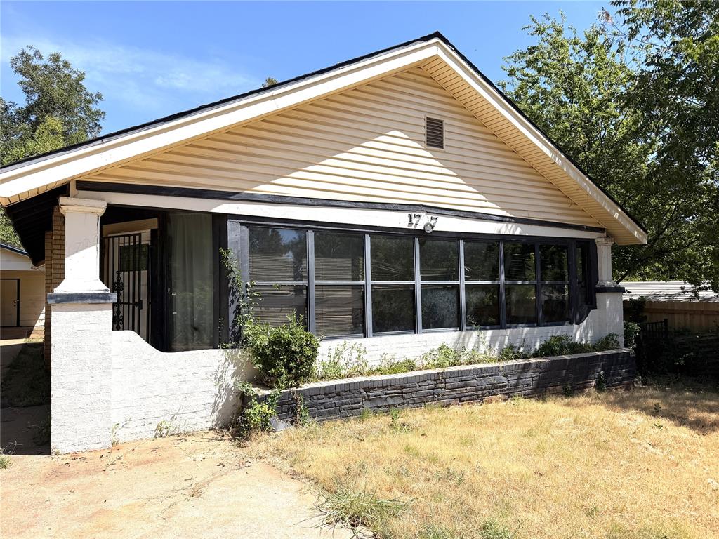Bring your vision to 1707 E. Park Pl in Oklahoma City! This 1-bedroom, 1-bathroom home offers a practical layout and a large enclosed front porch that spans the full width of the home, providing additional flexible space. The property also features a spacious backyard, covered carport, and attached storage building for added convenience. With plenty of potential to personalize and make the space your own, this property presents an opportunity to create something special. Conveniently located with easy access to I-35, I-40, and OU Medical Center, this property offers a convenient location for accessing major roadways, medical facilities, shopping, dining, and more