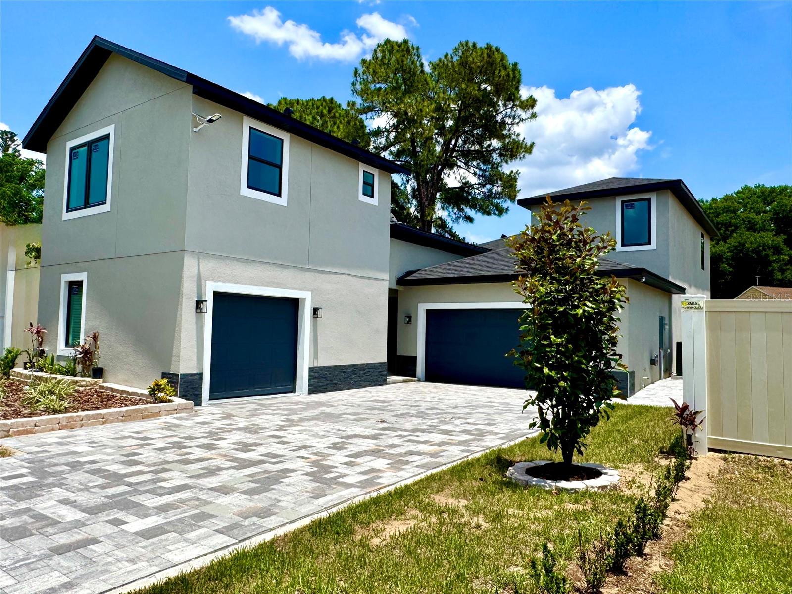 Looking for one Charming Dual-Residence Home with Income Potential in Prime Orlando Location ??

Welcome to 107 Grove Street, a unique property offering both, a spacious main house and a versatile guest suite, perfectly situated in Orlando’s Metrowest/Ocoee area.

 • Main House: Spacious living areas designed for comfort and functionality. The versatile plan will catch you the minute you enter, with a spacious open floor plan and high ceiling, over a beautiful wood look tile flooring. The kitchen is equipped with a modern stainless steel appliances including a french door refrigerator, and a large island with a modern quartz countertop where the Home Chef can enjoy the family while cooking as the family room, kitchen, and dining room are all open to each other, creating a perfect spot for family hangouts or weekend gathering, also there is a half bath for your visits. On lower level you find a gorgeous Master/Primary Bedroom with two walking closets, a large shower and double vanity sink with a quartz countertop. Still on first floor, you have a second suite with its own full bathroom, besides a laundry room with access to a 2-car garage with epoxy flooring. Head upstairs to find two more spacious bedrooms also with high ceiling and the 3rd bathroom.
 • Guest Apartment Suite (In-Law Suite): Located above the third garage, this private apartment includes 1 bedroom, 1 bathroom, a great room, kitchen, and laundry area. Ideal for guests, extended family, or as a rental unit to generate additional income. A third garage and a extra private area on this guest apartment lower level provide ample storage or workspace.

Outdoor Amenities:
 • Expansive Backyard: A generous outdoor space offering endless possibilities—build your dream pool, an outdoor kitchen, or a playground.
 • Driveway: Accommodates up to 4 vehicles, ensuring ample parking for residents and guests.
 • Prime Location: Quick access to major highways, as the Florida Turnpike, 408, 429 and West Colonial Dr, facilitating easy commutes throughout the Orlando area.
 • Recreation: Directly across the street from Rose Place Park, offering green spaces, and recreational opportunities for all sports and ages.
 • Convenience: Close proximity to shopping centers, dining options, and Orlando Health Hospital and medical clinics, ensuring all your daily needs are within reach. 
 • No HOA or CDD Fees: Enjoy the freedom of homeownership without the added costs of Homeowners Association or Community Development District fees. Also, park your truck, trailer, RV or boat without an HOA restrictions.
 • Income Potential: The detached guest apartment provides an excellent opportunity for a extra rental income, helping to offset mortgage costs or serve as an investment property.
        * FURNITURE STAGING THE PROPERTY AVAILABLE FOR SALE SEPARATELY, AND CAN BE INCLUDED ON YOUR FINANCING !!!

Don’t miss out on this exceptional opportunity to own a versatile and income-generating property in one of Orlando’s desirable neighborhoods. Contact us today to schedule a private showing and explore the potential of 107 Grove Street!