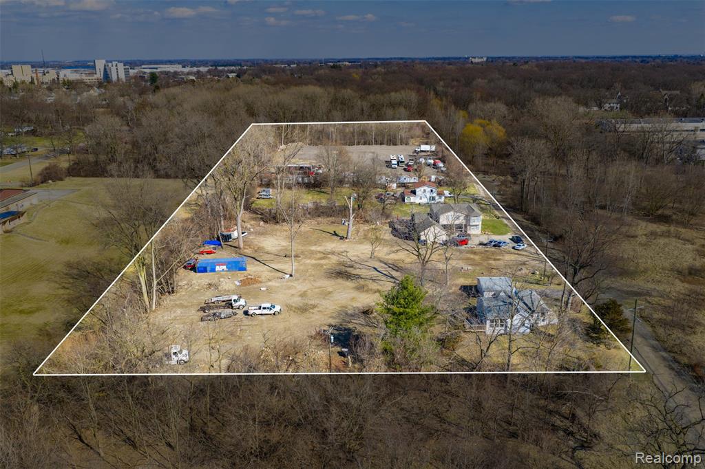 Investors, here is your opportunity to own the only undeveloped land in the Bloomfield - Bloomfield hills area. This 4 parcel, 6.5-acre, property located on Fremont st right off of Franklin rd features 3 houses, a private road, and sits adjacent to the proposed multi-million-dollar Bloomfield Hollow project! With commercial zoning c3 already in place, the opportunities are endless! Sale includes 424, 374, 362, & 350 Fremont St. The property is already generating over $6000/month! 350 Fremont is already zoned and being used as commercial truck parking and generating $3000 per month. 424 Fremont has 2br 1ba with basement and is generating $1650/month. 374 Fremont has 4br 3.5ba and has the potential to fetch $3000/month. 362 Fremont has 3br and 2ba and generating $1750/month. Residential and commercial tenants can stay, making this a cash flowing property day 1 or the property can be delivered totally vacant and ready for redevelopment asap! The proposed 30,000 sq ft event venue is slated to break ground this year and will bring variety of upscale events and patrons to the area and will make this property a perfect place for a potential hotel, restaurant, condominiums, or mixed-use development.  Act now and act fast and be the first to capitalize on this potential multi-million-dollar high yield investment!