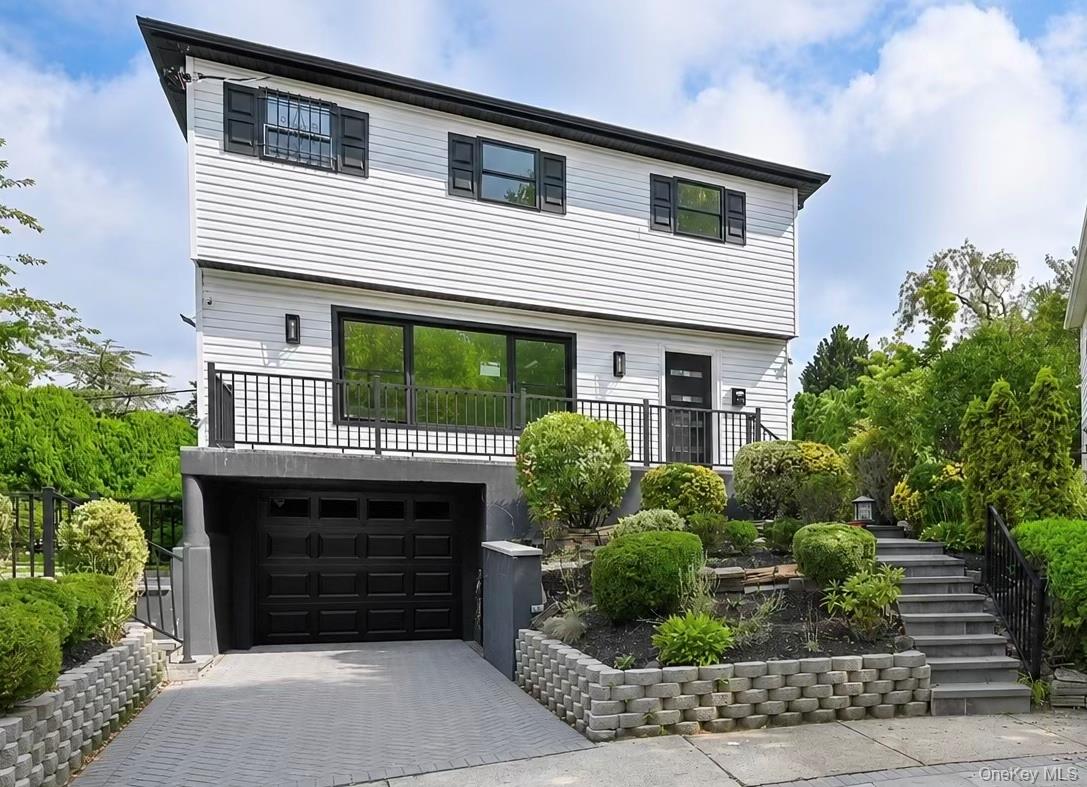 Mint, Modern and Beautiful Newly Reconstructed Detached Colonial on a Great Block In the Heart of Malba Gardens, Whitestone! Main Floor features  Foyer, LR, FDR, EIK, 1/2 Bath. Second Floor features 3 Bedrooms, 1 Full Bath w/Sep Shower & Bath Tub. Full Finished Bsmt w/Family Room, Full Bath, Access to 1 Car Garage (New Door) & Driveway. Very Sunny Rooms Throughout. Meticulously Designed With Very High Quality Materials and Craftsmanship Throughout! Totally Brand New From Top to Bottom- New Exterior & Siding, New Roof, New Plumbing & Electrical, New Windows, New Kit & Baths, Floors & Tiles, New Doors & Light Fixtures, Central Air Conditioning, Etc. New Front Balcony w/Beautiful Stone & Tile Work, New Steps & Concrete. Private, Over Sized Yard plus Sep Seating Area & BBQ Area. Beautifully Landscaped. Fantastic Location on a Quiet, Cul De Sac Street w/Access to Transportation, Easy Access to Flushing/Main Street, Shopping, Restaurants and All Major Highways!