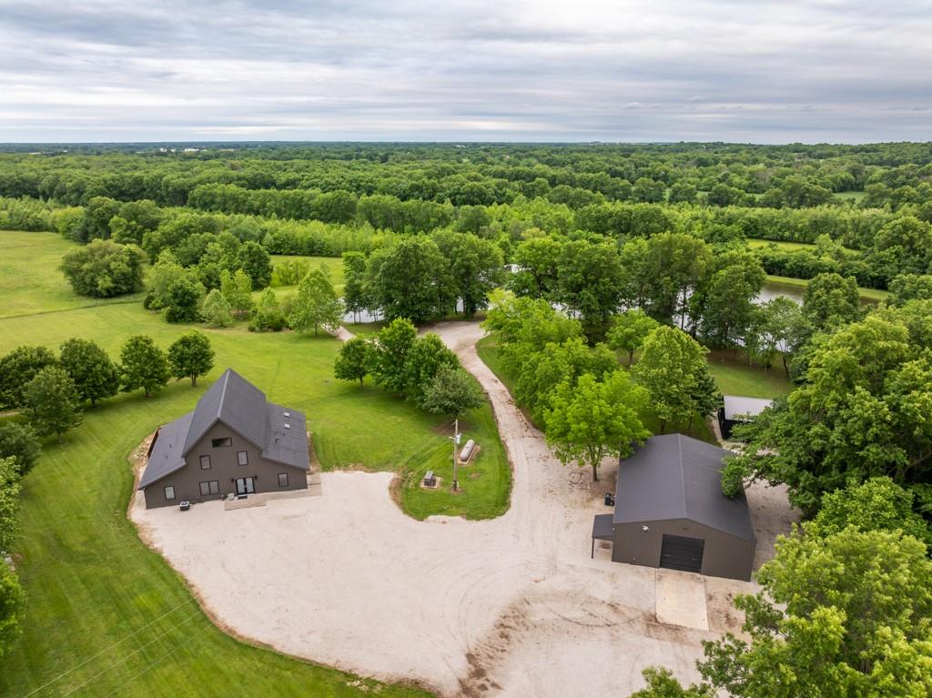 If you are looking for that perfect place to call home, or perfect place to entertain clients and guests, you have found the one.  This beautifully constructed timber frame home sits on approximately 109 acres of diverse habitat, loaded with wildlife.  This extremely secluded 2,600 Sq ft timber frame home has that rustic open floor concept, but with many recent updates.  Currently the home offers 1 bedroom and 2 bathrooms with ample room to add additional bedrooms if needed.  The exterior walls are SIP panel construction, making the home extremely energy efficient. The large loft area is great for entertaining and provides incredible views of the property through its large windows and walkway.   A new large deck has been recently installed and there is a large heated stamped concrete patio below the deck that would make for an incredible outdoor kitchen area for entertaining along with a partial basement that could be finished for additional guest space or rec room.  There is a newly constructed 60x104 shop with full concrete, overhead doors, and textured metal siding.  The 40x60 insulated shop next to the home has heated concrete floors, half bath, and separate room that would make a nice office with an outside dog run attached.  There is another newly constructed 28x30 metal building with overhead doors by the pond that would make a nice storage area for boats and other pond toys or could be finished as a private guest quarters.  Speaking of the pond, this 2.5 acre 26’ deep custom built pond is loaded with fish with a boat launch for convenience.  Excellent deer and turkey numbers with potential for development of a nice wetland near the Mormon Fork that flows through the backside of the property.  This is a major travel corridor for wildlife and the sheer number of deer on this property is something you have to see to fully appreciate.  The land is extremely diverse offering a mix of timber and hay fields, resulting in a tremendous amount of cover and food.