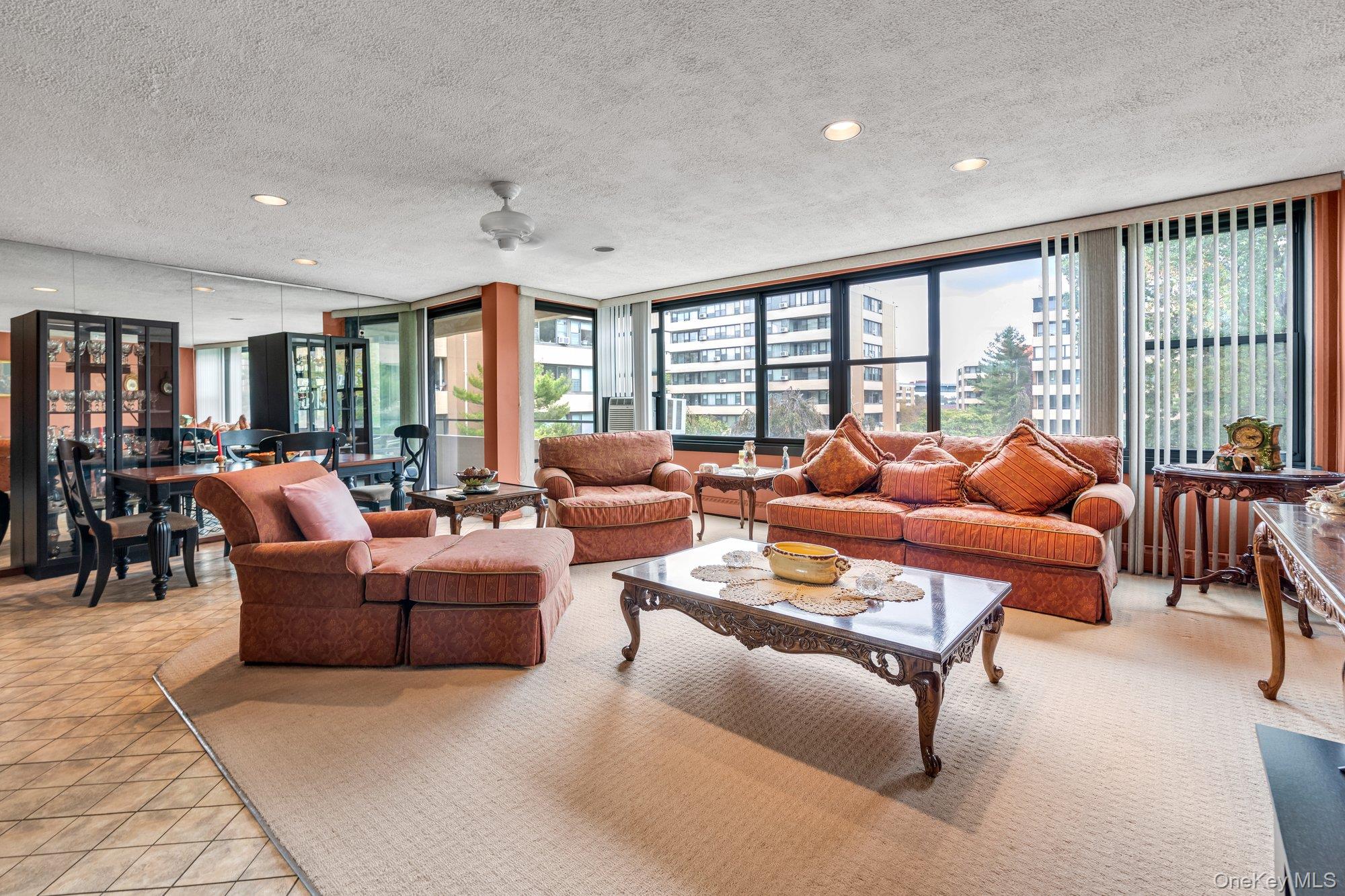 Bright and spacious eastern exposure with extreme sunlight. This 2 bedroom one bath offers a flexible layout with great potential.  In overall good condition, this home is ready for your personal touch and updates to make it truly shine. The apartment boasts a generous living area with ample closet space.  Your private terrace overlooking the pool with two entrances from the master bedroom and living room for your year round enjoyment.  Lehavre offers 2 outdoor swimming pools, 3 tennis courts, clubhouse including fitness center with classes.  Lehavre sits on 27 acres of land with beautifully maintained grounds. Parking available for transfer