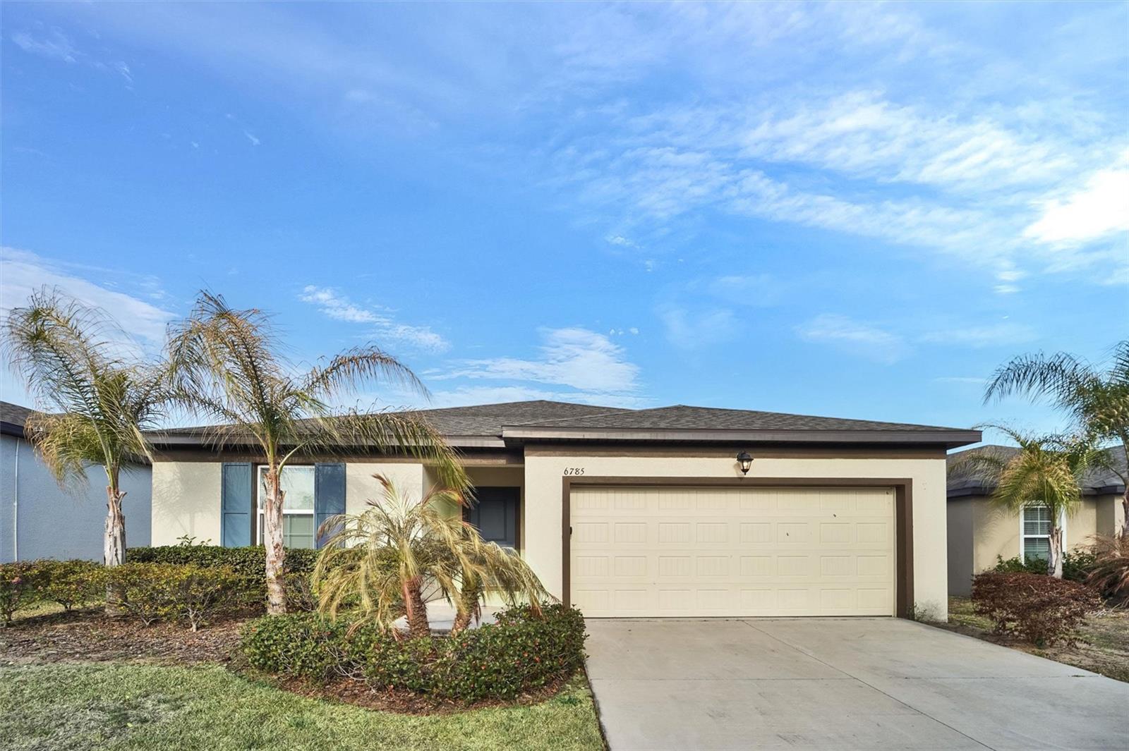 One or more photo(s) has been virtually staged. Welcome to 6785 Branham Mill Ct. in the highly desirable Links at Calusa Springs, one of Zephyrhills’ newest communities offering the rare advantage of NO CDD and a low $125 per month HOA. Situated on a quiet cul-de-sac street. This 2022 home features an open concept floorplan with four bedrooms, two-baths, designed for comfortable everyday living and effortless entertaining. The spacious living area offers a bright, airy layout that flows seamlessly into the kitchen. The kitchen features generous counter space, ample cabinetry, a center island, and a full suite of stainless-steel appliances. The primary suite includes a walk-in closet and a private en-suite bath, while the split-bedroom layout provides added privacy for family or guests. One of the standout features of this home is the backyard setting, there are no rear neighbors, and the property overlooks open green space and community area, creating a peaceful and private backdrop. Enjoy Florida living outdoors on the covered lanai, perfect for relaxing evenings or hosting gatherings. Location truly sets this home apart. With convenient access to Hwy 301, SR 54, and I-75 via Overpass Road, commuting to Tampa and Wesley Chapel is simple and efficient. You’re just 15 minutes from the renowned Epperson and Mirada Lagoons, where resort-style amenities enhance everyday living. Shopping, dining, schools, golf courses, and healthcare facilities are all within easy reach. If you’re searching for a move-in ready newer construction home in Zephyrhills with no CDD fees, low HOA, privacy with no backyard neighbors, and convenient access to Tampa, this property delivers location, lifestyle, and exceptional value.