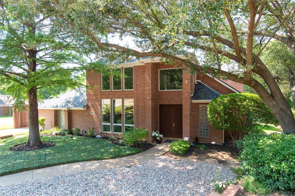 Contemporary custom-built 2-story home situated on one of the largest lots in Western Oaks subdivision (0.848 acres). This spacious updated home offers 4 bedrooms, 3.5 bathrooms, and multiple living and entertaining areas. Grand double-door entry welcomes you into a soaring 2-story foyer and oversized living room flooded with natural light. Entertain with ease in the formal dining room with vaulted ceiling or the inviting family room featuring built-ins cabinets, shelves and fireplace. The kitchen boasts granite countertops, island with sink, workstation, double ovens, microwave, and 4-burner gas cooktop. Utility room has pocket-door, sink, built-in ironing board and cabinets. Freshly painted interior and carpet installed in July 2025, as well as, updated secondary bathrooms. First-floor private primary suite showcases a tray ceiling, recessed lighting, and wood-look tile flooring that continues into the remodeled ensuite bath and closet. Spa-like bathroom features skylight, heated floors, soaking tub, frameless river rock shower, ceiling fan, and dual vanities while the walk-in closet includes a built-in ironing board and chest of drawers. Upstairs, three spacious bedrooms, one with cedar closet, another with pocket-door, Jack-and-Jill bath, an additional full bath, and a large game room with a raised ceiling, wet bar with bar seating, wine fridge & rack, and built-ins—plus a walk-out balcony overlooking the greenbelt. The 4th bedroom includes built-in cabinets and shelves with a desk area, making it ideal for a private office or guest suite. Additional highlights include an intercom system, central vacuum, 3-car garage configured with a 2-car bay and a separate single-car bay, all windows have a lifetime transferable warranty, plus a composition, hail-resistant Class IV roof (installed July 2025). The property backs to a serene green space and a tranquil creek.