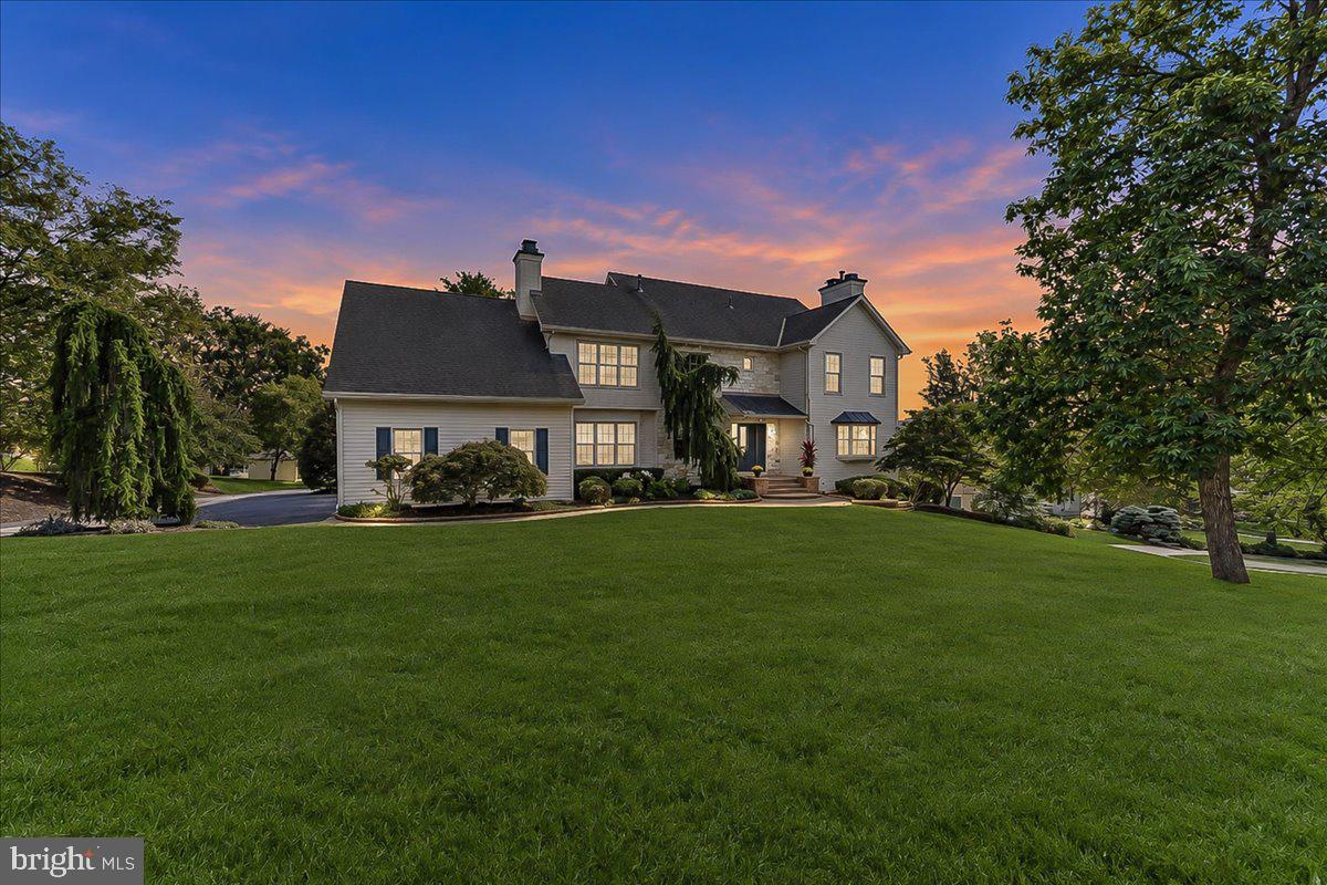 Over 5,000 square feet of finished living space on 1.17 acres in Spring-Ford Area School District just minutes from downtown Phoenixville. Located in desirable Upper Providence Township, this spacious home showcases custom finishes, generous room sizes, and an inviting floor plan designed for both everyday living and entertaining. This home features a beautifully designed custom kitchen featuring granite countertops, custom cabinetry, a built-in desk area, stainless steel appliances, gas cooktop, built-in oven, built-in microwave, and more. The main level also offers a formal dining room, living room, and an expansive open family room filled with natural light, with sliders to a large deck.  A convenient first-floor laundry/mudroom adds functionality to the thoughtfully designed layout. Adding warmth and character throughout the home are four gas fireplaces. Upstairs, you'll find four generously sized bedrooms, including a spacious primary suite highlighted by a beautifully appointed custom primary bathroom. The custom-finished lower level provides exceptional additional living and entertaining space. Complete with custom built-ins and a wet bar featuring granite countertops, a built-in stove and microwave, this level is ideal for entertaining, movie nights, game days, or simply relaxing. A large cedar closet provides additional storage. Step onto the large deck overlooking the beautifully landscaped backyard a wonderful setting for outdoor dining, entertaining, or simply enjoying the surroundings. Additional highlights include an oversized two-car garage and a custom front walkway that creates an attractive approach to the home.Conveniently located just minutes from vibrant downtown Phoenixville, where you can enjoy an array of restaurants, shops, entertainment, and community events. Commuters will appreciate easy access to Route 422, Route 29, Route 202, and the Pennsylvania Turnpike, making travel throughout the surrounding area convenient.