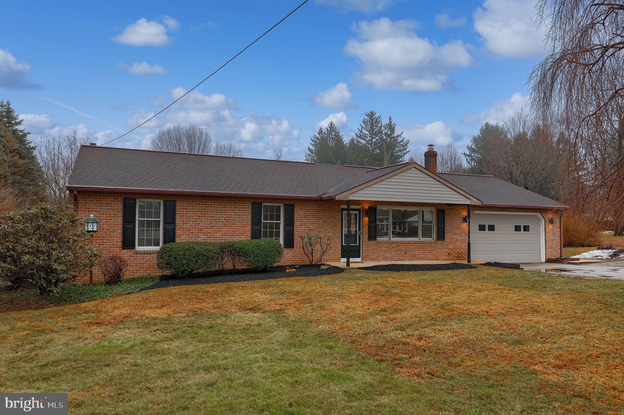 Charming updated rancher on a private 1-acre lot. This home features a welcoming family room with cathedral ceilings and a cozy wood-burning fireplace, along with a formal living room, eat-in kitchen, and separate dining room. The main level includes three bedrooms, two full baths, and convenient first-floor laundry. A large lower level provides ample storage and potential for future expansion. Schedule your tour of this home, located in a peaceful setting, just minutes from major routes.