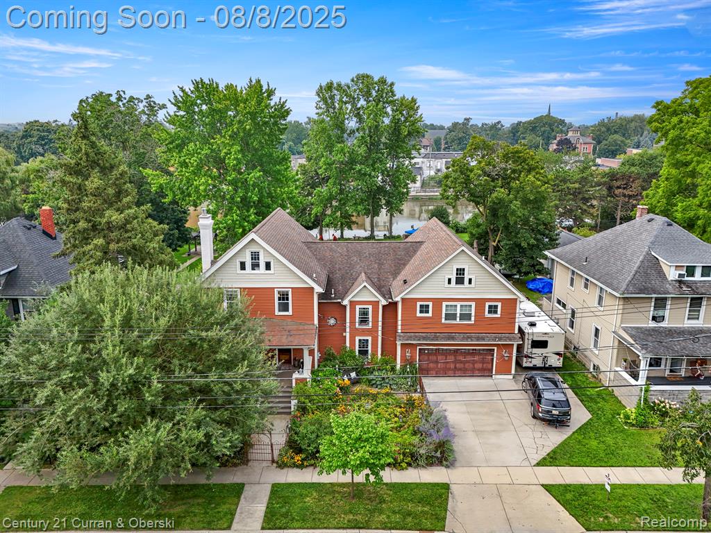 **WOW**BEAUTIFUL 3700+ SQ FT 4 BEDROOM, 2 AND A HALF BATHROOM HOME IN THE HEART OF MONROE**RIGHT OFF THE RAISIN RIVER**SPACIOUS LIVING ROOM WITH FIREPLACE**GORGEOUS UPDATED KITCHEN WITH A COPPER SINK AND A LARGE ISLAND WITH PLENTY OF SEATING FOR ENTERTAINING**2ND FLOOR FEATURES THE MASTER SUITE WITH A MASTER EN SUITE BATHROOM WITH A COPPER SOAKING TUB AND HUGE WALK IN CLOSET**THREE ADDITIONAL SPACIOUS BEDROOMS UPSTAIRS WITH PLENTY OF CLOSET SPACE**FULL CUSTOM UPDATED BATH LOCATED CONVENIENTLY BETWEEN BEDROOMS AND ADDITIONAL HALF BATH**BEAUTIFUL FAMILY ROOM WITH DOORWALL LEADING TO CUSTOM BACK PATIO**BASEMENT HAS PLENTY OF ROOM FOR STORAGE**ABSOLUTELY GOURGOUES HARDWOOD FLOORS THROUGHOUT**LARGE PRIVATE BACKYARD OASIS**ENDLESS BEAUTIFUL GARDENS**CUSTOM HEATED INGROUND SALTWATER POOL AND POOL/COTTAGE HOUSE ALL OVER LOOKING THE RAISIN RIVER**OVERSIZED ATTACHED 2 CAR GARAGE**SMALL DOCK ALLOWED ON THE RAISIN**UPDATED WINDOWS**UPDATED SIDING**UPDATED ROOF**THE DETAILS IN THIS HOME WOULD TAKE YEARS TO COVER, THE FLOORS,TRIM,MOLDINGS,UPDATES,BATHROOMS,DOORS,GARDENS**COME SEE IT IN PERSON TO SEE ALL THIS HOME HAS TO OFFER**ADDITION AND MANY UPDATES COMPLETED IN 2013**