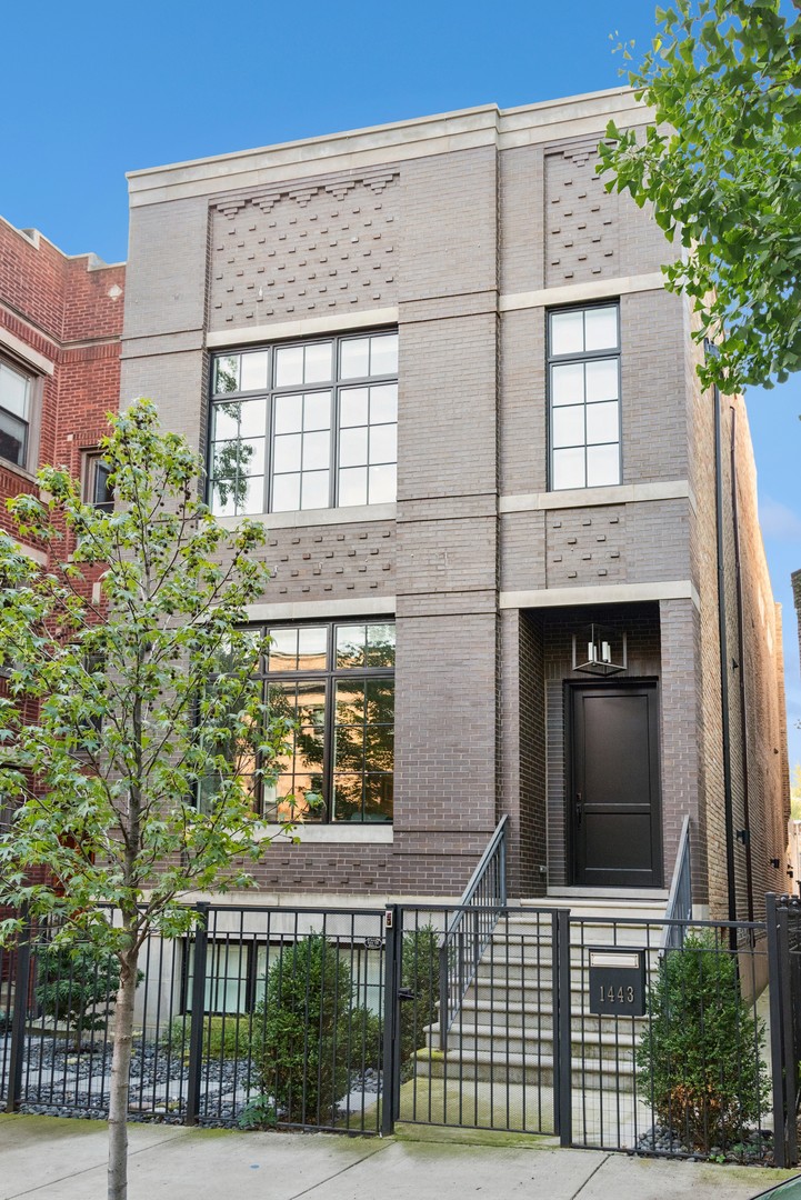 One of a kind, masterfully crafted, stand out 5 bedroom residence on one of the most coveted streets in the main heart of Andersonville. A half block east of Clark Street and steps to the pulse of the neighborhood. Another exquisite Tylo Development Partners LLC single family features 3 bedrooms on one floor plus a guest or in-law suite on lower level, 4.1 decadent bathrooms. This combination of classic contemporary style, 11' ceilings, incredible natural light sources, 2500 square feet of private outdoor space lends itself both to an entertainer's dream home and a very family friendly experience to raise children with bedrooms on one floor and conducive layout with an open kitchen concept and adjacent "play spaces", easy access to first level backyard with some grass set on a 30' wide lot. Impressive, distinct and all masonry and limestone front, double stacked, oversized bay windows with motorized shades, all restored Chicago brick sides walls. Crisp color palette for fine art display and beautiful and fun wallpaper sprinkled throughout the rooms of this home. Ring System security with locked front gate, Smart Home System. Foyer greets, gracious formal living room with fireplace outfit with heavy limestone mantle and hearth. First floor powder room. Classic contemporary wall wainscoting, coffered ceilings, all 7" wide plank, real "tongue and groove" hardwood floors throughout, sumptuous 5,400 square feet of interior living space. Open kitchen concept with separate and designated dining room. Gourmet kitchen featuring massive 14' island, built in sink, comfortable seating for five, mitered quartz counters in white with grey veining, slab backsplash, Subzero, high end and custom all wood cabinetry dressed in white and walnut, separate pantry, black gold hardware. Six burner, high output Wolf range with double oven, vented culinary hood, stainless steel appliance package. Family room continues the kitchen space with fireplace and extra cabinetry including dry bar, wine and beverage coolers, windows on on three sides and collapsable panel of glass "accordion style" with a screen leading out to first floor outdoor space with pavers and grass, 2.5 car all brick garage with EV charger, epoxy floor, roof top deck above. Cohesive custom light fixtures, chandeliers, ceiling fans, romantic iron patterned staircase, wood treads, laundry room with sink, folding space, side by side washer and dyer, cabinetry in the middle of the second floor. Ensuite bathrooms. The sumptuous primary bedroom includes two walk-in closets, a shoe closet, crown moldings and tall, detailed baseboards throughout, fireplace. Primary bathroom features exquisite marble patterned floor, separate, oversized vanities with quartz counters, free standing soaking tub, separate shower with rain, toilet room, and window for a natural light source. Four additional, great sized bedrooms and three additional bathrooms dressed in finest quartz and marbler stone. Full floor plate lower level offers home theatre room and play space for children, a second laundry room, additional storage, and wet bar. Every closet in this home has custom built ins. The roof top deck is decadent IPE, total privacy above the neighbors, fireplace, view of the Chicago Skyline, two remote controlled retractable pergolas. The Brilliant SMART Home Control Home System features 27 speakers, Wi-Fi 6, nine camera and lighting system security system and remote access. Newly added water filtration system in addition to water softener, reverse osmosis, window treatments, landscaping renovation, sump pump backup battery, water alarm sensors, Reme Halo air purification. Bring your most discriminating buyer. This is the crown of Andersonville and the season.
