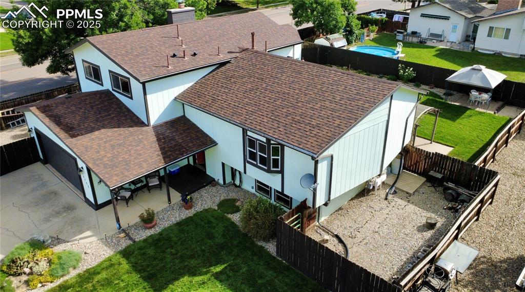 Experience elevated living in this custom 4-level home where luxury, comfort, and thoughtful design meet against the backdrop of mountain views. Perfectly positioned on a spacious corner lot, this property offers both privacy and peace while also providing valuable visibility for those who work from home or operate a home-based business. With 4 bedrooms, 3 baths, and an oversized 2-car garage, this residence blends timeless craftsmanship with modern upgrades. A rare find with no HOA, this home gives you the freedom to fully enjoy your property. Full RV hookups plus a sewage drain make it easy to keep your camper or trailer at home—saving storage costs while adding unmatched convenience. A 12x10 shed with loft, concrete pad, and electric adds even more flexibility. Inside, enjoy solid oak trim, Stainmaster carpet with pet padding, European oak, parquet flooring, and a remodeled kitchen with porcelain tile, marble backsplash, sleek appliances, and a refrigerator with beverage center. Comfort is enhanced by newer windows, a wood-burning fireplace, whole-house humidifier, electrostatic furnace filter, and ceiling fans. The primary suite features a spa-style shower with granite tile floors. A finished laundry room with cabinets, sink, and washer/dryer plus a remodeled bar with granite counters make everyday living and entertaining effortless. Outdoors, the property shines with meticulously landscaped grounds, gazebo, pergola, horseshoe pits, sprinkler system, newer cedar fencing, 6” exterior walls for insulation, a Class 4 roof, and so much more! The corner lot creates a sense of space and separation while still being part of an established neighborhood, and the quiet setting makes the property feel like a true retreat. This home is a rare combination of luxury, functionality, and freedom—ideal for adventurers, home-based professionals, and anyone seeking a private yet convenient piece of Colorado Springs. A property that truly offers more than a home—it's a lifestyle.