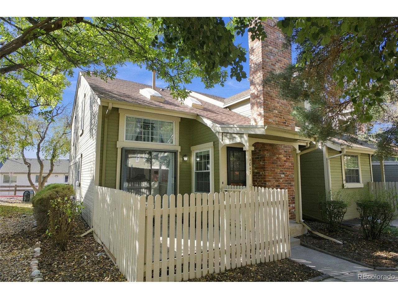 Nestled among the trees in the highly sought-after Quincy Hill subdivision of South Aurora, this charming 2-bedroom, 2-bathroom townhome offers approximately 1,160 square feet of comfortable living space. The inviting interior features vaulted ceilings, decorative beams, skylights, updated paint, and updated LVP flooring, creating a bright and welcoming atmosphere. Cozy up by the wood-burning fireplace or enjoy the updated kitchen featuring beautiful granite countertops. An unfinished basement provides additional storage or the opportunity to customize the space to suit your needs, washer and dryer are included for added convenience. Ideally located just minutes from Cherry Creek State Park, with convenient access to RTD transit, E-470, I-225, and Parker Road, this home offers a wonderful blend of comfort, convenience, and Colorado living