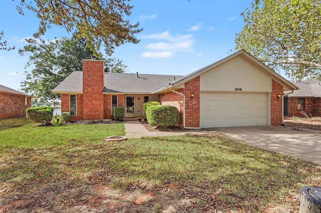 Lake views like this are a rare find! Located in Edmond’s Chisholm Lake neighborhood, this 3-bedroom, 2-bath home offers a spacious backyard overlooking the beautiful neighborhood lake, with no homes directly behind it. The oversized living room flows into the dining area and partially open kitchen, creating a comfortable layout for everyday living and entertaining. Enjoy lake views from the kitchen window, along with granite countertops, a stone-look backsplash and stainless steel appliances. Tile flooring extends through the kitchen and both bathrooms, while laminate flooring runs throughout the rest of the home—no carpet! The primary bedroom includes a full bathroom, and all three bedrooms feature ceiling fans. Recent improvements include a new roof installed in August 2026, fresh interior and exterior paint, and an added concrete patio ideal for relaxing and enjoying the peaceful water view. Additional features include double-hung windows, blinds and built-in blinds in the patio doors. Conveniently located near restaurants, shopping and other Edmond amenities, this special lakefront setting deserves a closer look!