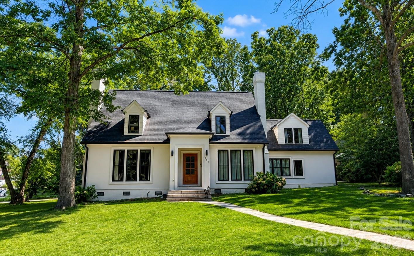This beautifully updated Cape Cod-inspired home blends timeless character with modern luxury—and best of all, there's no HOA! Offering 4 bedrooms and 3.5 bathrooms, this thoughtfully designed home features a desirable main-level primary suite. The spa-inspired primary bathroom is a true retreat, complete with a freestanding soaking tub, oversized walk-in shower, walk-in closet, and its own cozy wood-burning fireplace. Upstairs, you'll find two additional bedrooms and a full bathroom, while the private fourth bedroom offers flexibility as an in-law suite, guest retreat, or bonus living space.Oversized custom windows flood the home with natural light, creating bright and inviting living spaces throughout. The kitchen features white quartz countertops, a high-end Kutch gas range, and a spacious walk-in pantry. Around the corner is a welcoming family room with a second wood-burning fireplace, providing the perfect gathering space. Extensive updates provide peace of mind, including a complete remodel in 2022, a newer HVAC system and roof (2022), new water and sewer lines (2023), crawlspace encapsulation with a dehumidifier and new vapor barrier (2023), and gutter guards (2023).Conveniently located near the Gaston Country Club, this exceptional home offers the perfect combination of style and comfort.