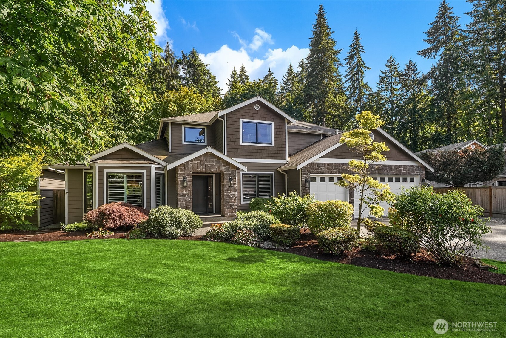 This exceptional home has been lovingly maintained & extensively remodeled in 2019 with new kitchen, windows, roof & more. Set on a spacious 16,553 SF lot, this 4BR/3.5BA home offers the space & flexibility you are looking for, including a large primary bedroom & a convenient main floor office/den. The oversized 1,053 SF 3-car garage includes bonus flex space that is perfect for a home gym, workshop, or hobby area. Step outside to your own private retreat: a beautifully designed patio, sport court & generous yard, ideal for entertaining or everyday outdoor living. Just a short drive to charming downtown Edmonds, enjoy easy access to waterfront dining, shopping, the ferry & vibrant local community. Thoughtfully updated & meticulously cared for, this is a rare opportunity in move-in-ready condition.