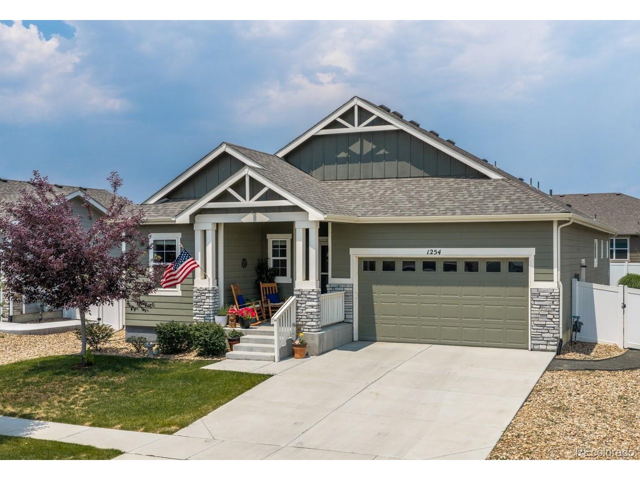 Welcome to this beautifully maintained newly-built home in neighborhood where pride of ownership is evident and neighbors foster a welcoming sense of community. The open floorpan was thoughtfully designed for both everyday living and easy entertaining, with the living room, kitchen + dining rooms flowing together seamlessly. The main-level primary suite is complete with a five-piece ensuite bath and a generous walk-in closet. Two additional main-level bedrooms provide flexible space for family, guests, or a home office. The well-appointed kitchen features a large granite island with seating for four, stainless steel appliances, a gas range, and a spacious walk-in pantry. The fully finished basement is a rarity in the neighborhood and offers incredible additional living space with an expansive great room, a wet bar, two more bedrooms, and a full bathroom. Whether you're hosting overnight guests, creating a private space for older children, or enjoying movie nights and game days, this versatile lower level can accommodate it all.The fully landscaped backyard is designed for both a peaceful outdoor space and ease of maintenance. Enjoy an extended patio for outdoor dining and entertaining, complemented by a blend of mature trees, ornamental grasses, perennial flowers, a lush lawn, and low-maintenance xeriscaping.Ideally situated less than a block from Hammond Farms Park, this home is just minutes from multiple reservoirs with miles of scenic walking and biking trails, open space, TPC Colorado Golf Course, the Berthoud Bike Park, and the Berthoud Recreation Center. You'll also appreciate the quick drive to charming downtown Berthoud, where you'll find local restaurants, breweries, and shops, along with convenient access to Loveland, Fort Collins, Longmont, Highway 287, and I-25.