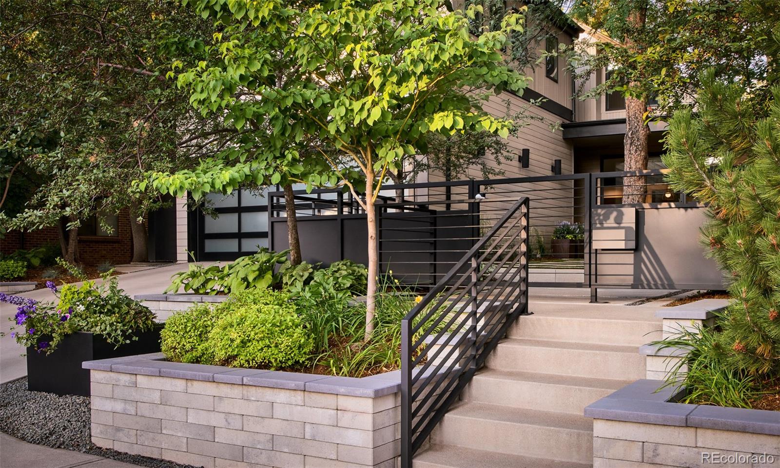 Luxury + Fun unite in this down-to-the-studs reinvention of our favorite 1970's Observatory Park home. Renovations preserved the stunning rooflines and interior charm, while delivering an on-point floor plan for you to host life and friends on the daily. You should know this is one of the very best streets in the neighborhood with a dead end to the south and with access from just two middle streets. This quiet address is further enhanced by a recent Lifescape landscape overhaul that makes the setting serene and unforgettable. Imported European cabinets throughout, modern kitchen, built-in bar, huge island with custom shelves and beverage fridge, and a showcase dining room that is a focal point of this home is recessed under a large circular skylight. The main level study, vaulted ceilings, sensational architecture and multiple options for bedrooms and offices deliver the creativity and flexibility many new homes today are missing. Additionally, the custom storage room on the main level handles appliance overflow, lockers, medicine cabinet, wine storage or whatever you need at your fingertips. All new plumbing, electrical, duct work, insulation, drywall, windows, roof tankless water heater and more were completed in 2021. There are two outdoor spaces for multi purpose entertaining -- the front raised yard gives privacy and has huge sliding doors that open up to the main living room, and the intentionally crafted backyard with fire pit, partially covered patio, built-in bar and grill area has two additional entrances to the interior. In summary, this home's indoor-outdoor access and flow instantly slow you down, while still being in the heart of the city.